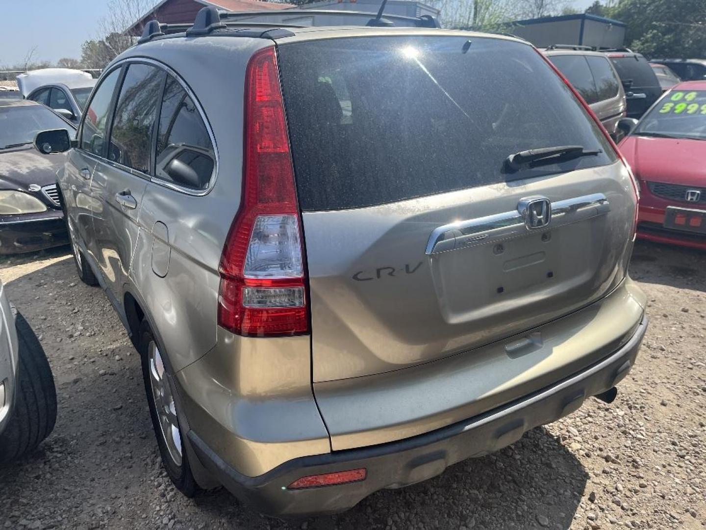 2007 BROWN HONDA CR-V EX-L 2WD AT (JHLRE38707C) with an 2.4L L4 DOHC 16V engine, AUTOMATIC transmission, located at 2303 West Mt. Houston, Houston, 77038, (281) 507-3956, 29.771597, -95.339569 - Photo#2