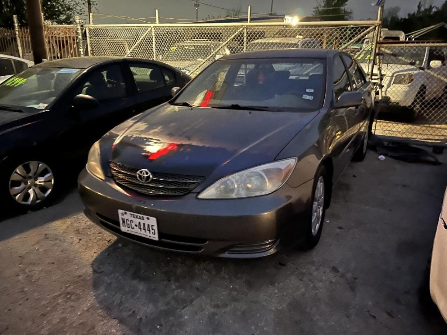 2002 BROWN TOYOTA CAMRY LE (4T1BE32K92U) with an 2.4L L4 DOHC 16V engine, AUTOMATIC transmission, located at 2303 West Mt. Houston, Houston, 77038, (281) 507-3956, 29.771597, -95.339569 - Photo#4