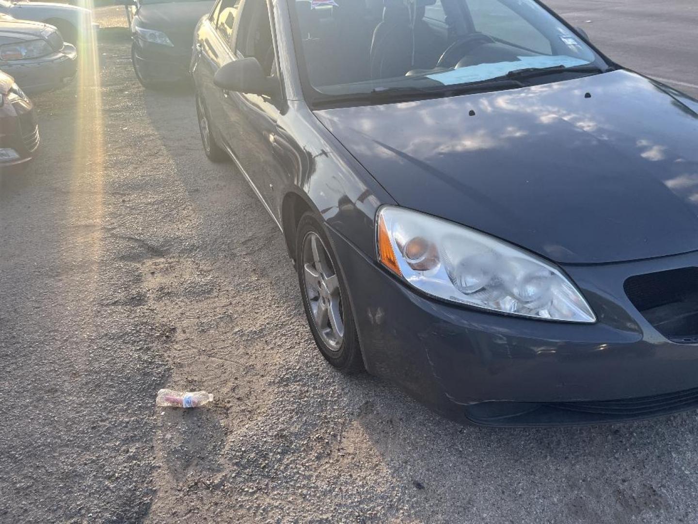 2009 BROWN PONTIAC G6 GT Sedan (1G2ZH57N294) with an 3.5L V6 OHV 12V engine, AUTOMATIC transmission, located at 2303 West Mt. Houston, Houston, 77038, (281) 507-3956, 29.771597, -95.339569 - Photo#0