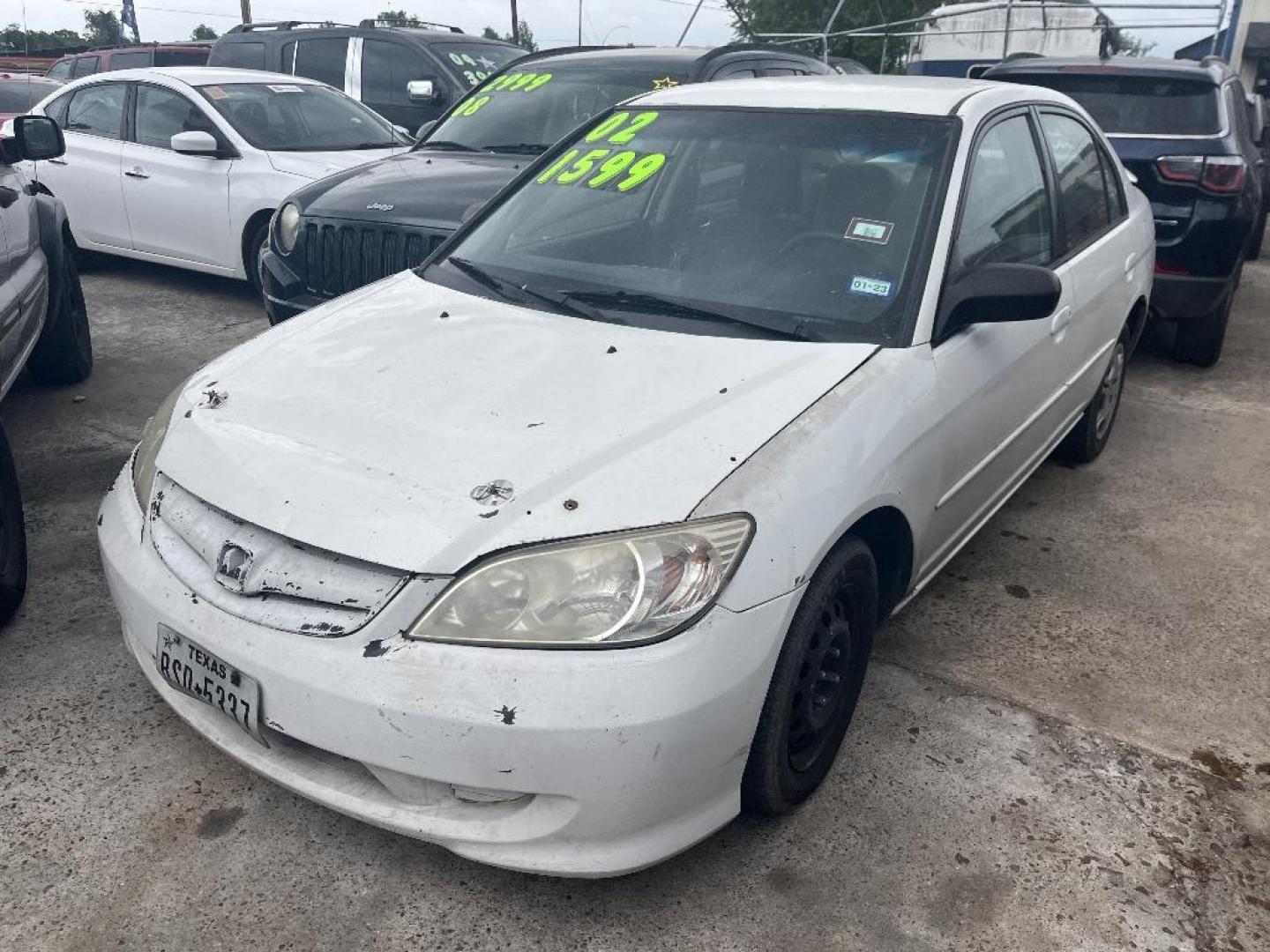 2002 WHITE HONDA CIVIC LX sedan (2HGES16502H) with an 1.7L L4 SOHC 16V engine, AUTOMATIC transmission, located at 2303 West Mt. Houston, Houston, 77038, (281) 507-3956, 29.771597, -95.339569 - Photo#0