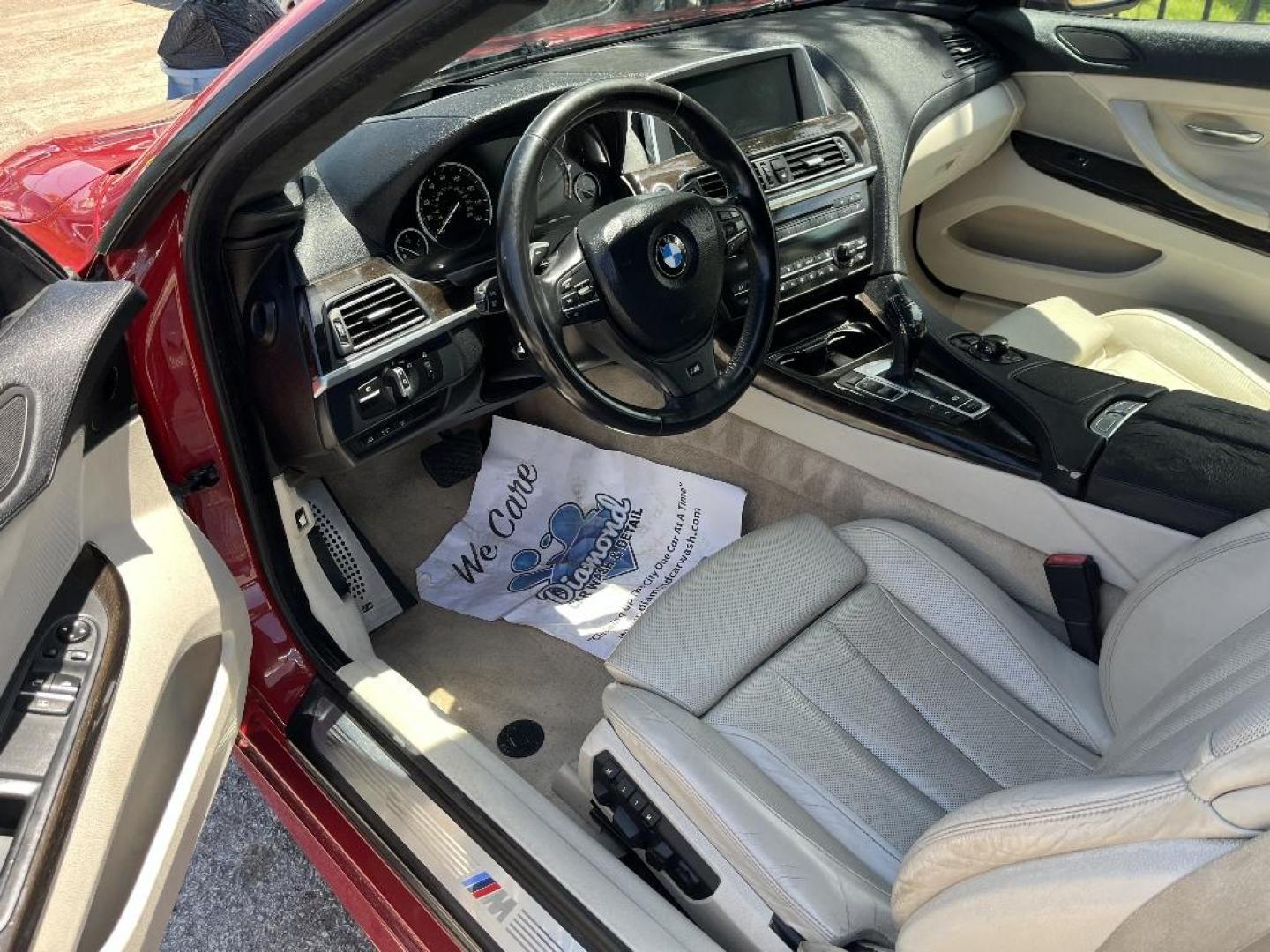 2012 RED BMW 6-SERIES 650i Coupe (WBALX3C53CC) with an 4.4L V8 DOHC 32V TURBO engine, AUTOMATIC transmission, located at 2303 West Mt. Houston, Houston, 77038, (281) 507-3956, 29.771597, -95.339569 - Photo#2