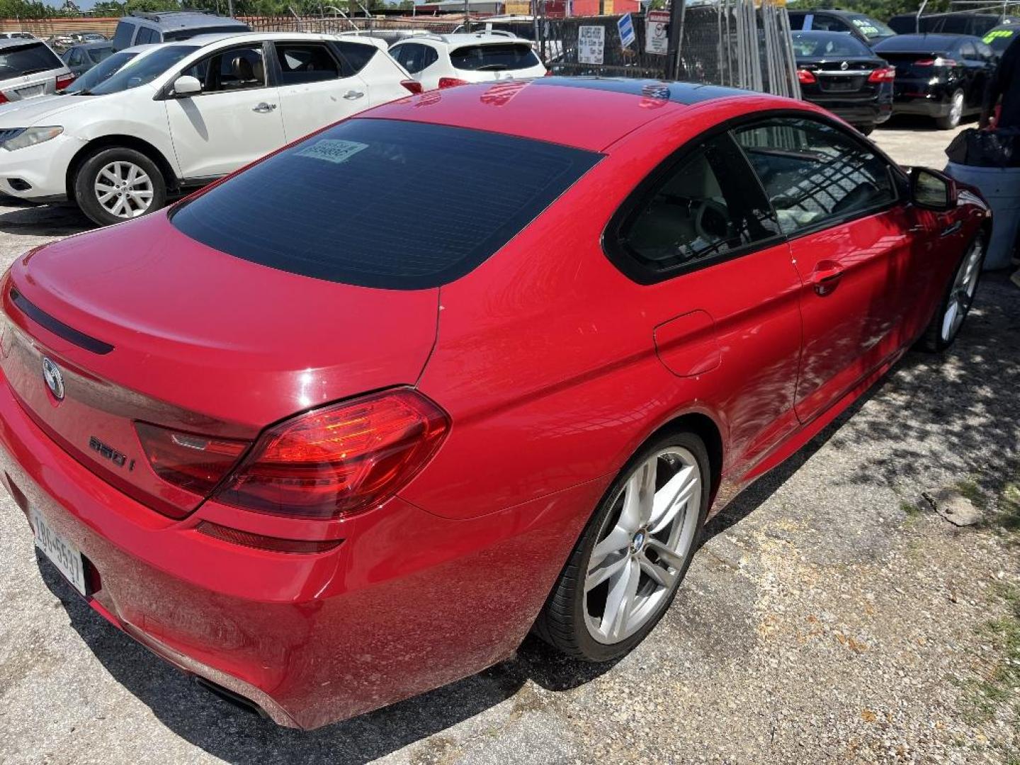 2012 RED BMW 6-SERIES 650i Coupe (WBALX3C53CC) with an 4.4L V8 DOHC 32V TURBO engine, AUTOMATIC transmission, located at 2303 West Mt. Houston, Houston, 77038, (281) 507-3956, 29.771597, -95.339569 - Photo#5