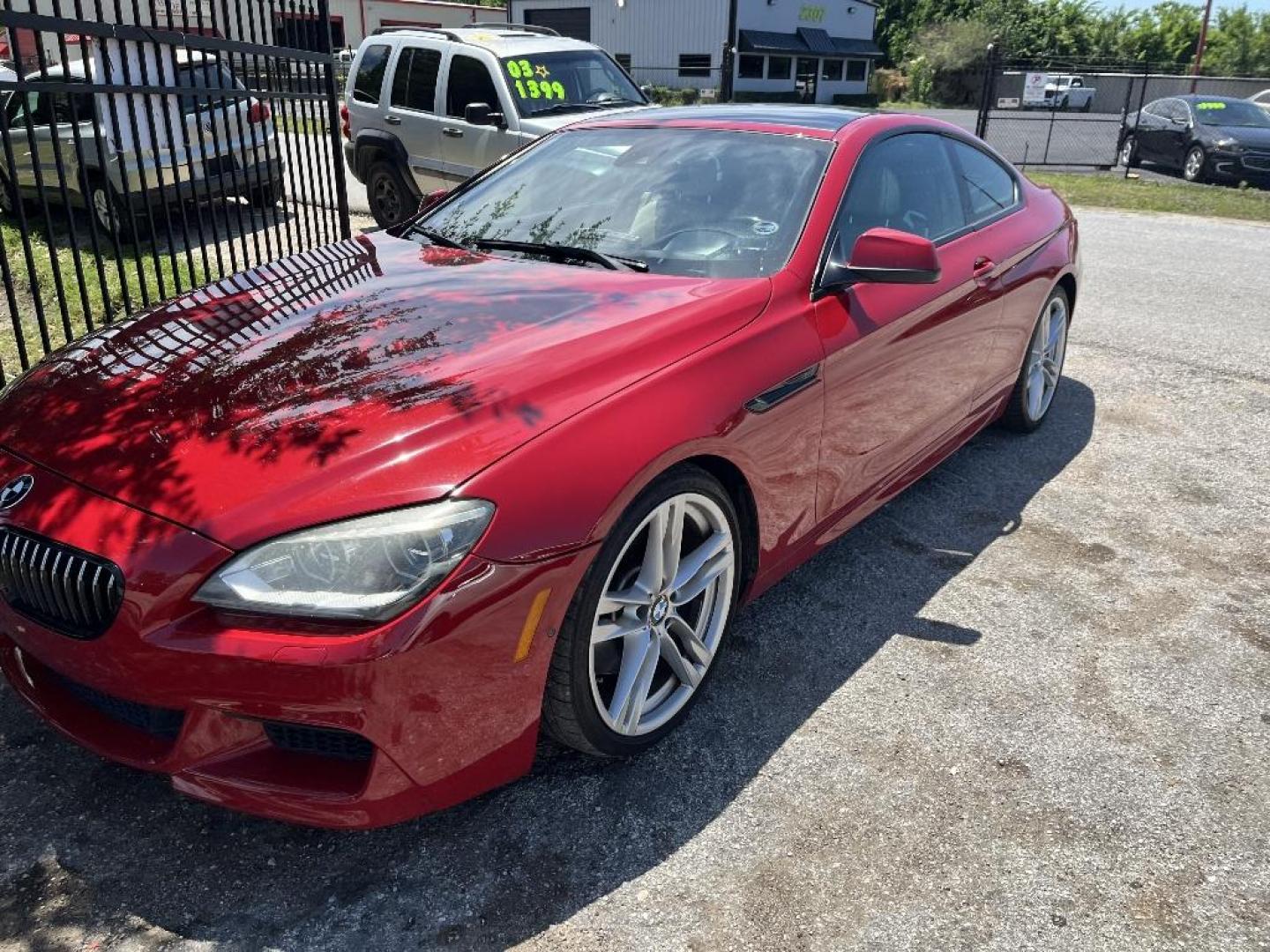 2012 RED BMW 6-SERIES 650i Coupe (WBALX3C53CC) with an 4.4L V8 DOHC 32V TURBO engine, AUTOMATIC transmission, located at 2303 West Mt. Houston, Houston, 77038, (281) 507-3956, 29.771597, -95.339569 - Photo#6