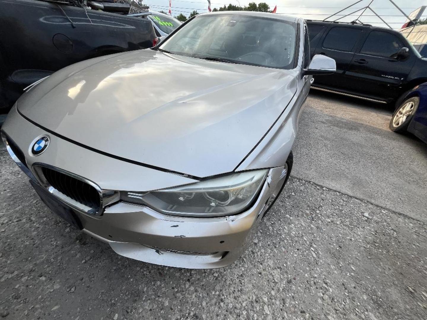 2014 BROWN BMW 3-SERIES 320i Sedan (WBA3B1C55EK) with an 2.0L L4 DOHC 16V engine, AUTOMATIC transmission, located at 2303 West Mt. Houston, Houston, Texas, 77038, (281) 507-3956, 29.771597, -95.339569 - Photo#0