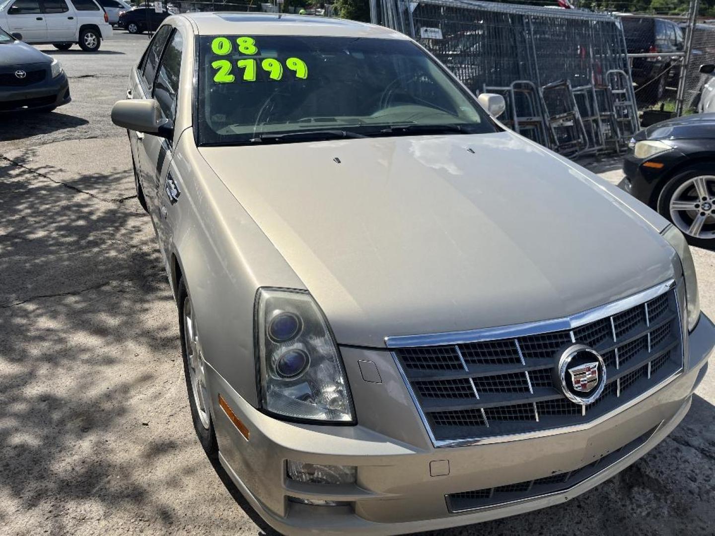 2008 BROWN CADILLAC STS V6 Luxury AWD with Navigation (1G6DD67V380) with an 3.6L V6 DOHC 24V engine, AUTOMATIC transmission, located at 2303 West Mt. Houston, Houston, Texas, 77038, (281) 507-3956, 29.771597, -95.339569 - Photo#0