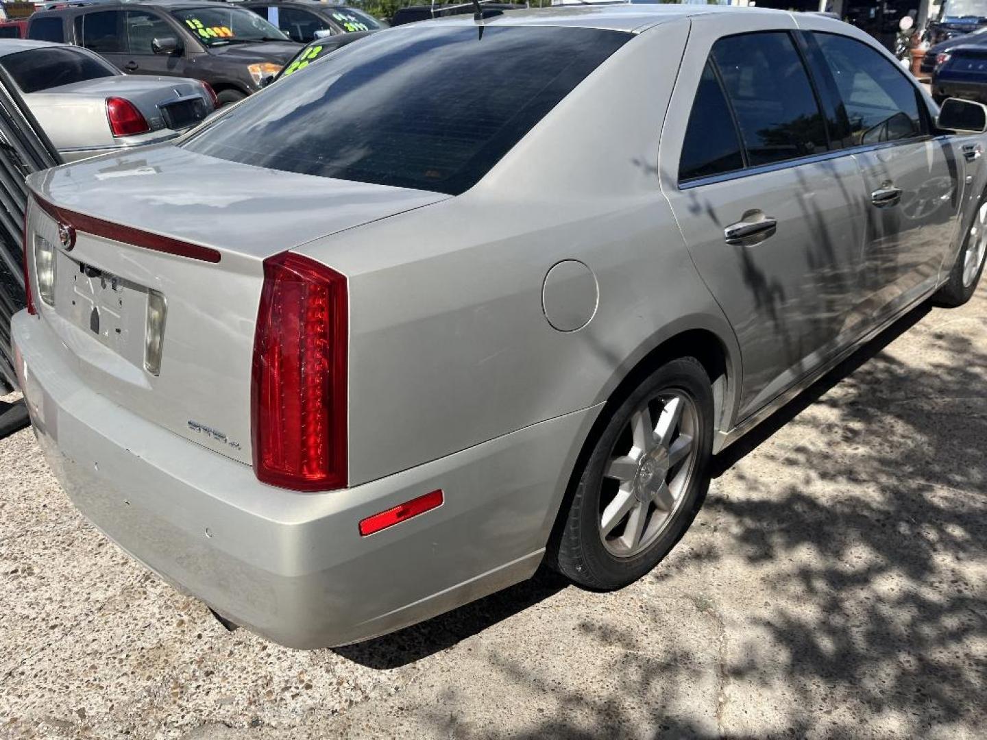 2008 BROWN CADILLAC STS V6 Luxury AWD with Navigation (1G6DD67V380) with an 3.6L V6 DOHC 24V engine, AUTOMATIC transmission, located at 2303 West Mt. Houston, Houston, Texas, 77038, (281) 507-3956, 29.771597, -95.339569 - Photo#1