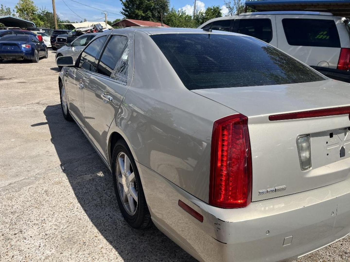 2008 BROWN CADILLAC STS V6 Luxury AWD with Navigation (1G6DD67V380) with an 3.6L V6 DOHC 24V engine, AUTOMATIC transmission, located at 2303 West Mt. Houston, Houston, Texas, 77038, (281) 507-3956, 29.771597, -95.339569 - Photo#4