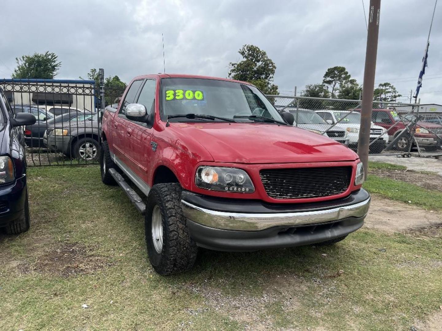 2001 RED FORD F-150 XLT SuperCrew 2WD (1FTRW07L01K) with an 5.4L V8 SOHC 16V engine, AUTOMATIC transmission, located at 2303 West Mt. Houston, Houston, Texas, 77038, (281) 507-3956, 29.771597, -95.339569 - Photo#0