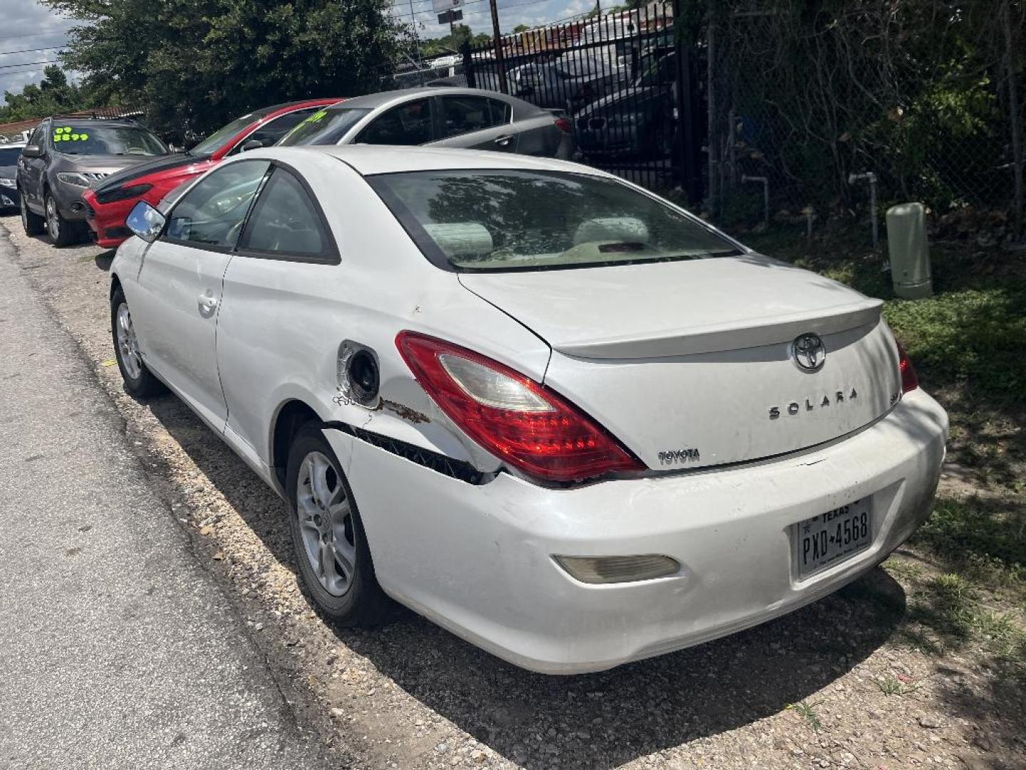 2008 WHITE TOYOTA CAMRY SOLARA Sport (4T1CE30PX8U) with an 2.4L L4 DOHC 16V engine, AUTOMATIC transmission, located at 2303 West Mt. Houston, Houston, Texas, 77038, (281) 507-3956, 29.771597, -95.339569 - Photo#4