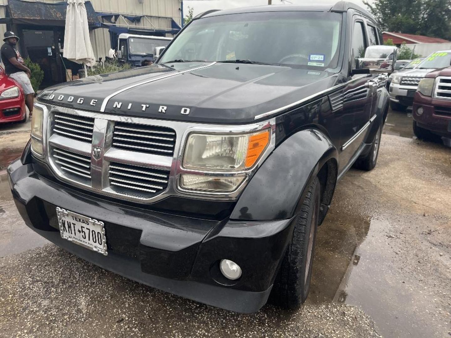 2011 BLACK DODGE NITRO SE 2WD (1D4PT2GK5BW) with an 3.7L V6 SOHC 12V engine, AUTOMATIC transmission, located at 2303 West Mt. Houston, Houston, Texas, 77038, (281) 507-3956, 29.771597, -95.339569 - Photo#0