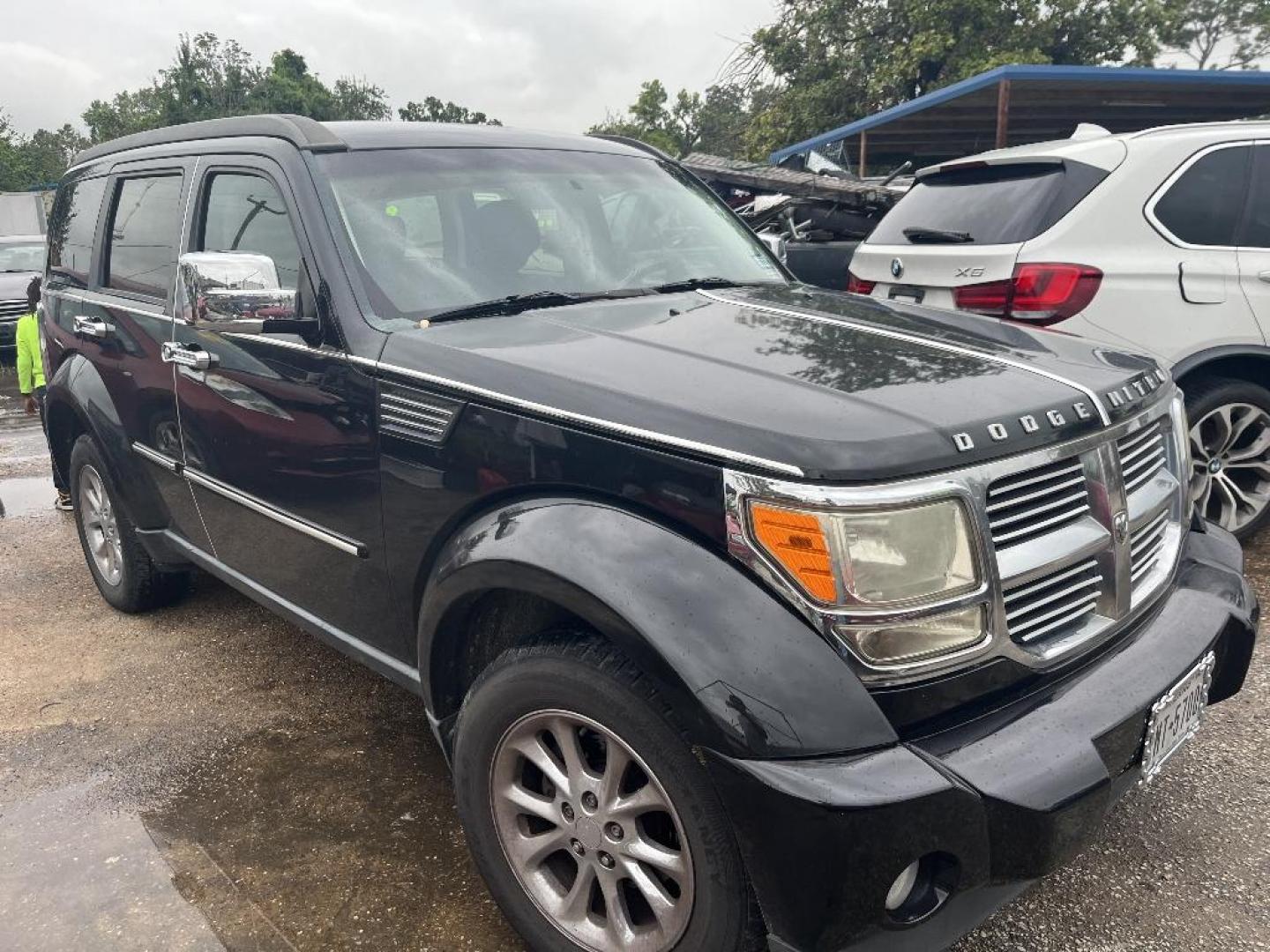 2011 BLACK DODGE NITRO SE 2WD (1D4PT2GK5BW) with an 3.7L V6 SOHC 12V engine, AUTOMATIC transmission, located at 2303 West Mt. Houston, Houston, Texas, 77038, (281) 507-3956, 29.771597, -95.339569 - Photo#2