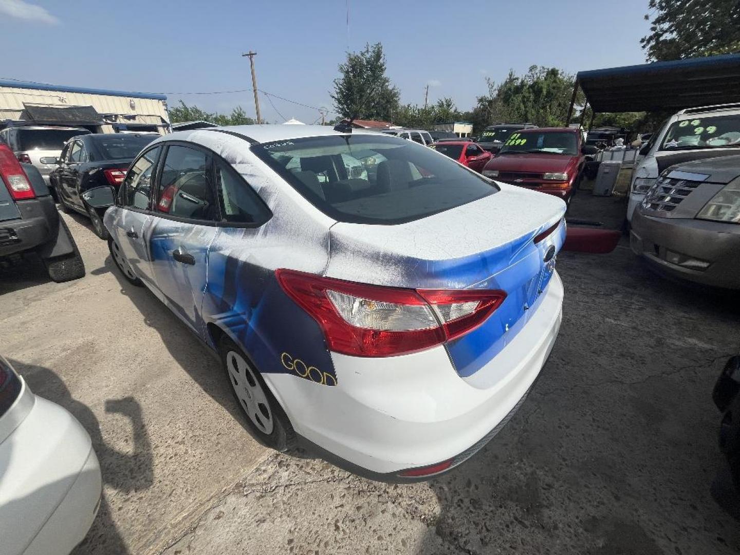 2013 WHITE FORD FOCUS S Sedan (1FADP3E27DL) with an 2.0L L4 DOHC 16V engine, AUTOMATIC transmission, located at 2303 West Mt. Houston, Houston, Texas, 77038, (281) 507-3956, 29.771597, -95.339569 - Photo#1