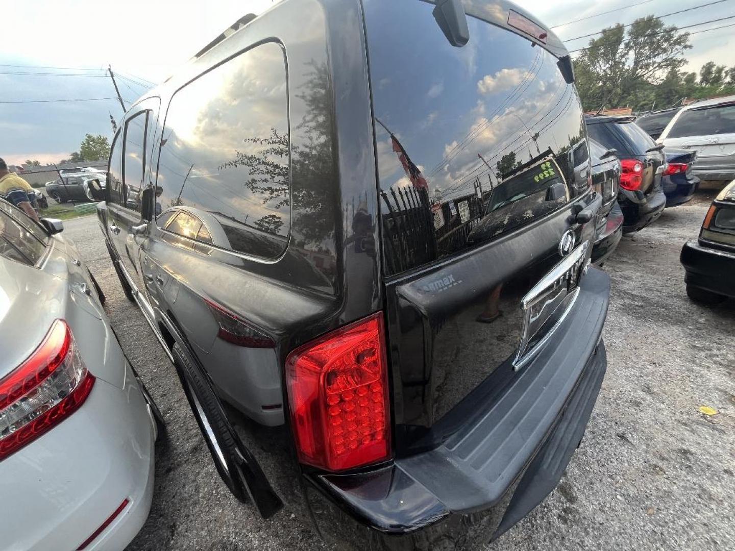 2009 BLACK INFINITI QX56 RWD (5N3AA08D19N) with an 5.6L V8 DOHC 32V engine, AUTOMATIC transmission, located at 2303 West Mt. Houston, Houston, Texas, 77038, (281) 507-3956, 29.771597, -95.339569 - Photo#2