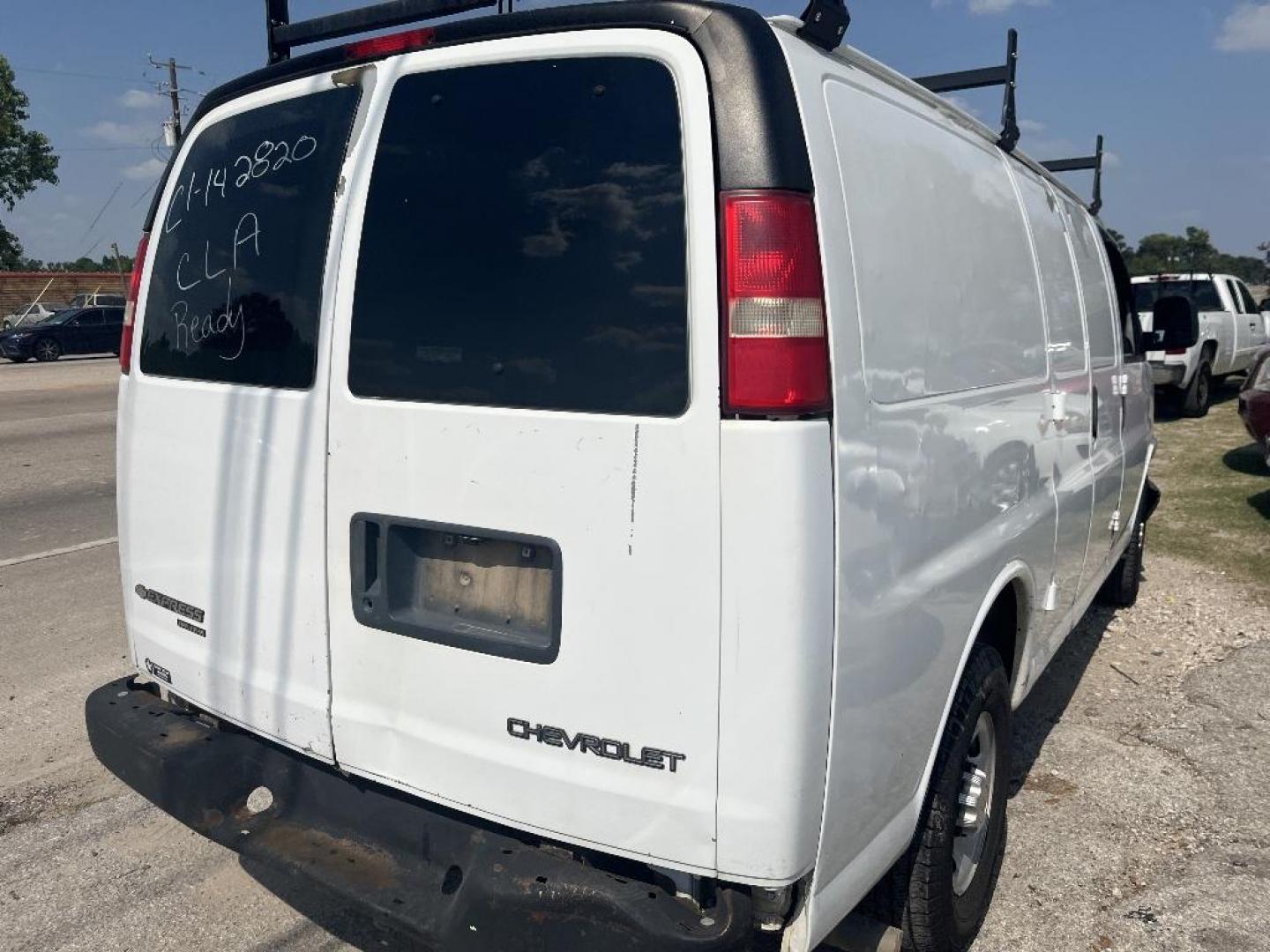 2012 WHITE CHEVROLET EXPRESS 2500 Cargo (1GCWGFCA6C1) with an 4.8L V8 OHV 16V FFV engine, AUTOMATIC transmission, located at 2303 West Mt. Houston, Houston, Texas, 77038, (281) 507-3956, 29.771597, -95.339569 - Photo#1