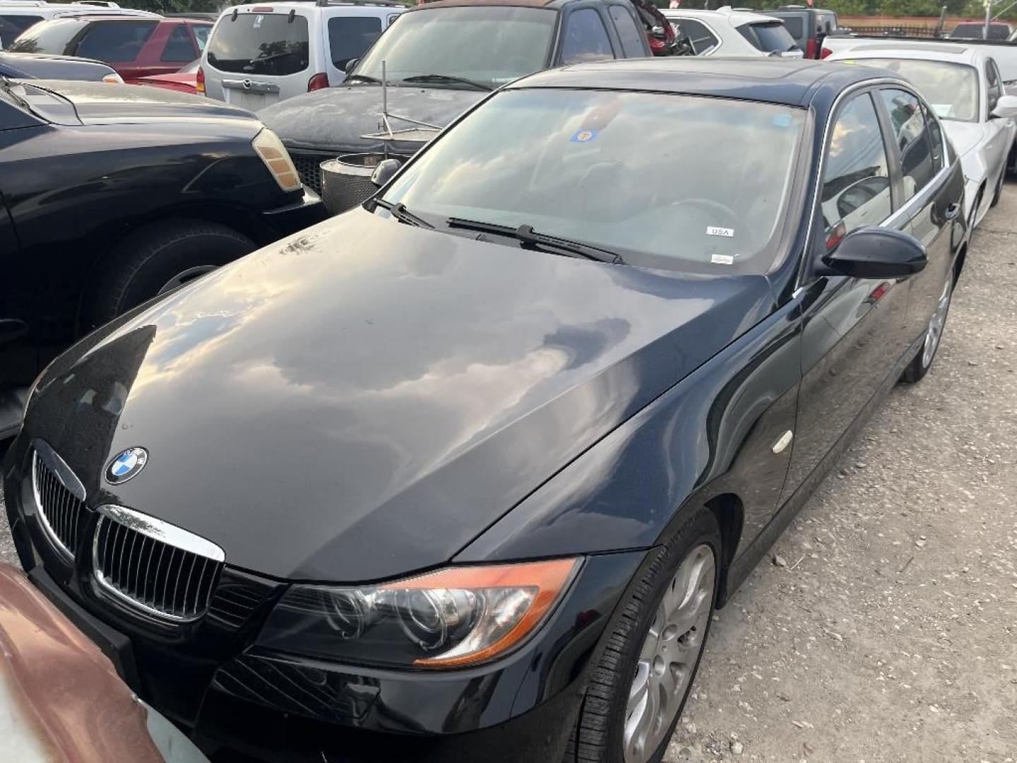 2007 BLACK BMW 3-SERIES 335xi (WBAVD53567A) with an 3.0L L6 DOHC 24V engine, AUTOMATIC transmission, located at 2303 West Mt. Houston, Houston, Texas, 77038, (281) 507-3956, 29.771597, -95.339569 - Photo#0