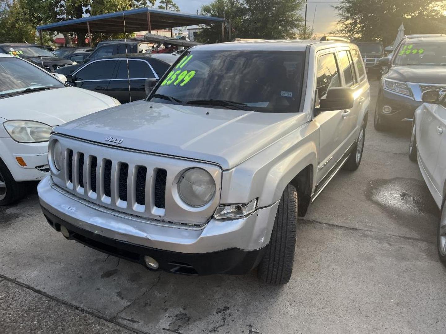 2011 GRAY JEEP PATRIOT 2WD (1J4NT1GB3BD) with an 2.4L L4 DOHC 16V engine, AUTOMATIC transmission, located at 2303 West Mt. Houston, Houston, Texas, 77038, (281) 507-3956, 29.771597, -95.339569 - Photo#0