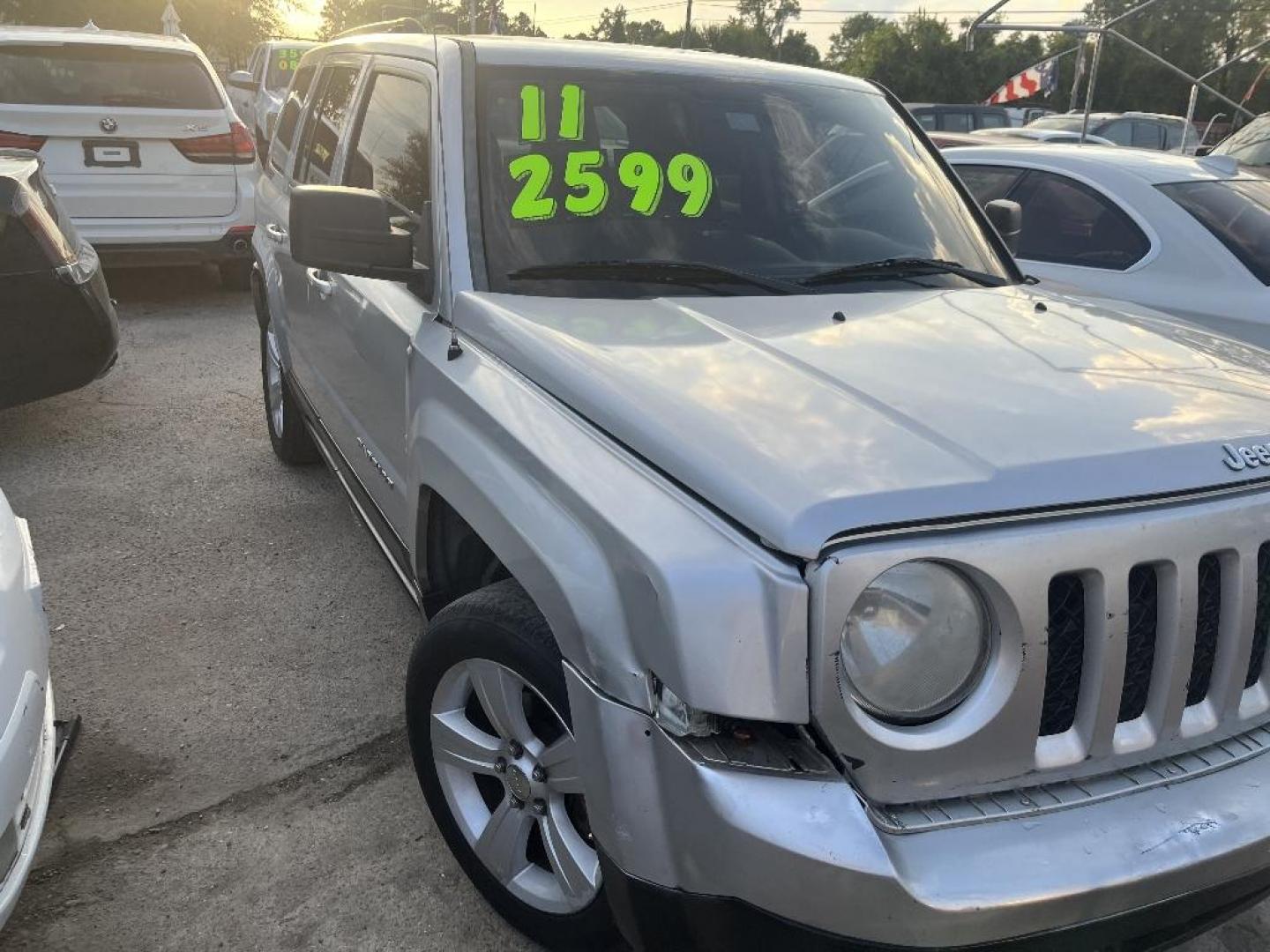 2011 GRAY JEEP PATRIOT 2WD (1J4NT1GB3BD) with an 2.4L L4 DOHC 16V engine, AUTOMATIC transmission, located at 2303 West Mt. Houston, Houston, Texas, 77038, (281) 507-3956, 29.771597, -95.339569 - Photo#3