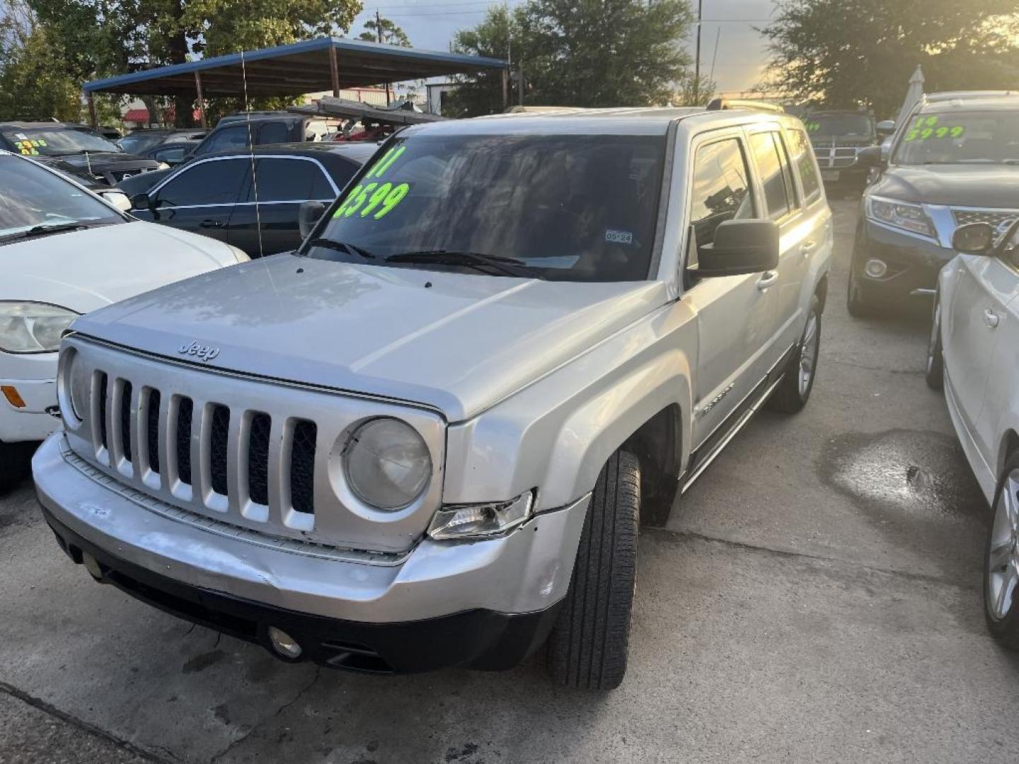 2011 GRAY JEEP PATRIOT 2WD (1J4NT1GB3BD) with an 2.4L L4 DOHC 16V engine, AUTOMATIC transmission, located at 2303 West Mt. Houston, Houston, Texas, 77038, (281) 507-3956, 29.771597, -95.339569 - Photo#4