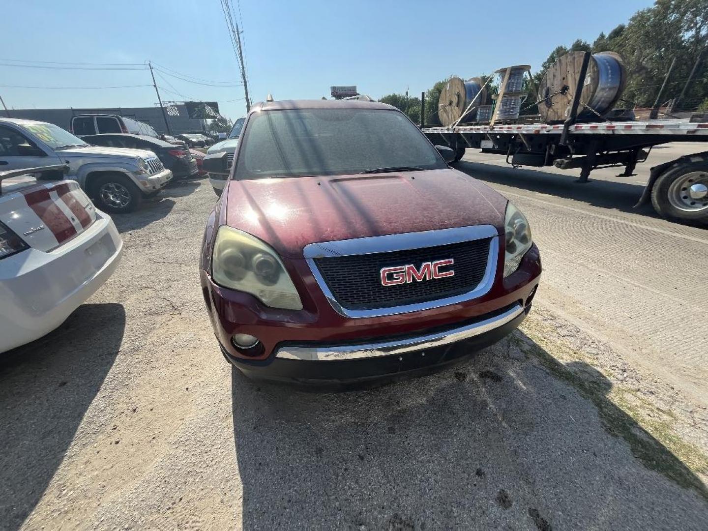 2010 MAROON GMC ACADIA SLE FWD (1GKLRLED3AJ) with an 3.6L V6 DOHC 24V engine, AUTOMATIC transmission, located at 2303 West Mt. Houston, Houston, Texas, 77038, (281) 507-3956, 29.771597, -95.339569 - Photo#0