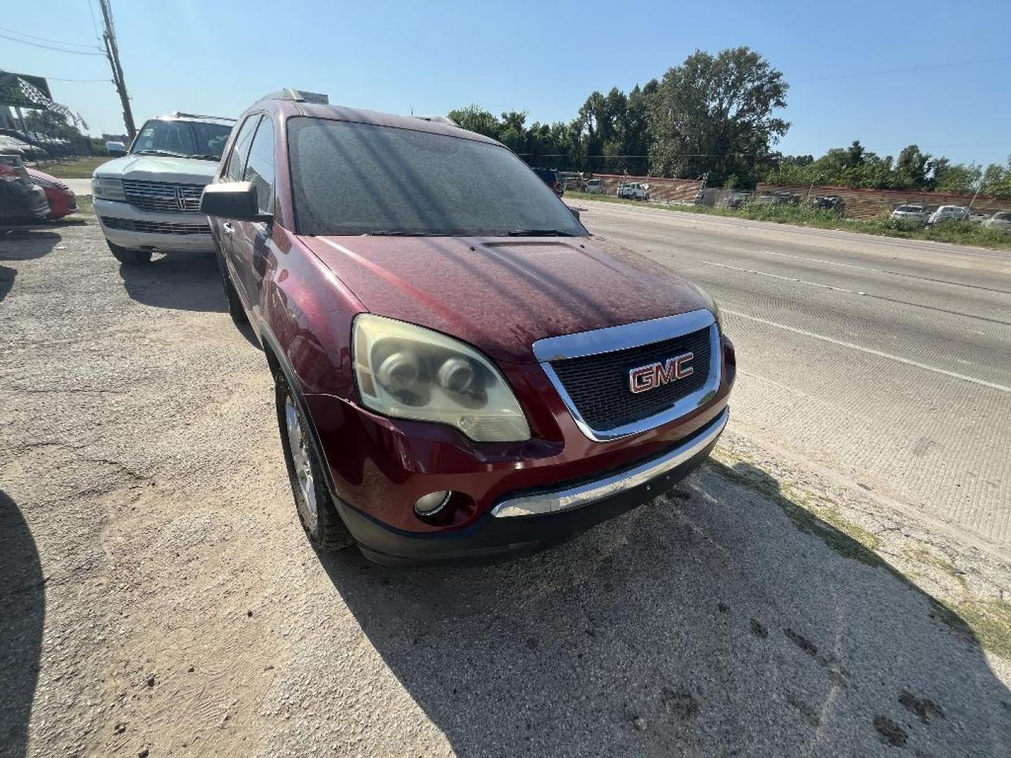 2010 MAROON GMC ACADIA SLE FWD (1GKLRLED3AJ) with an 3.6L V6 DOHC 24V engine, AUTOMATIC transmission, located at 2303 West Mt. Houston, Houston, Texas, 77038, (281) 507-3956, 29.771597, -95.339569 - Photo#1