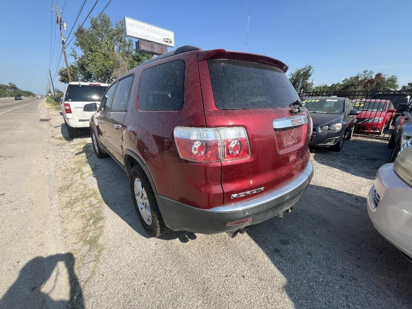 2010 MAROON GMC ACADIA SLE FWD (1GKLRLED3AJ) with an 3.6L V6 DOHC 24V engine, AUTOMATIC transmission, located at 2303 West Mt. Houston, Houston, Texas, 77038, (281) 507-3956, 29.771597, -95.339569 - Photo#2