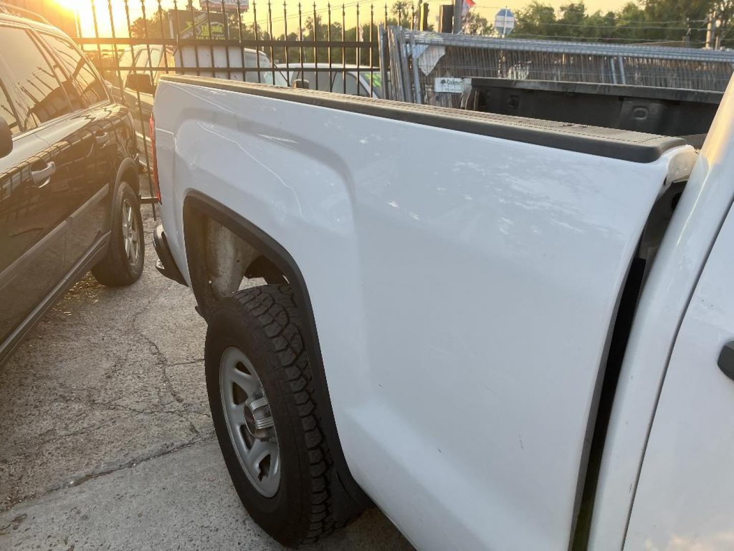 2015 WHITE GMC SIERRA 1500 Base Double Cab 2WD (1GTR1TEC8FZ) with an 5.3L V8 OHV 16V engine, AUTOMATIC transmission, located at 2303 West Mt. Houston, Houston, Texas, 77038, (281) 507-3956, 29.771597, -95.339569 - Photo#2