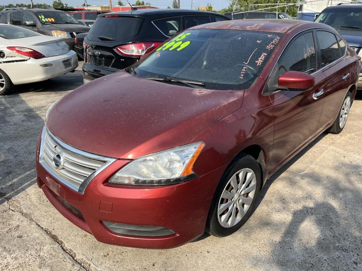 2015 RED NISSAN SENTRA S 6MT (3N1AB7AP0FY) with an 1.8L L4 SFI DOHC 16V engine, AUTOMATIC transmission, located at 2303 West Mt. Houston, Houston, Texas, 77038, (281) 507-3956, 29.771597, -95.339569 - Photo#0