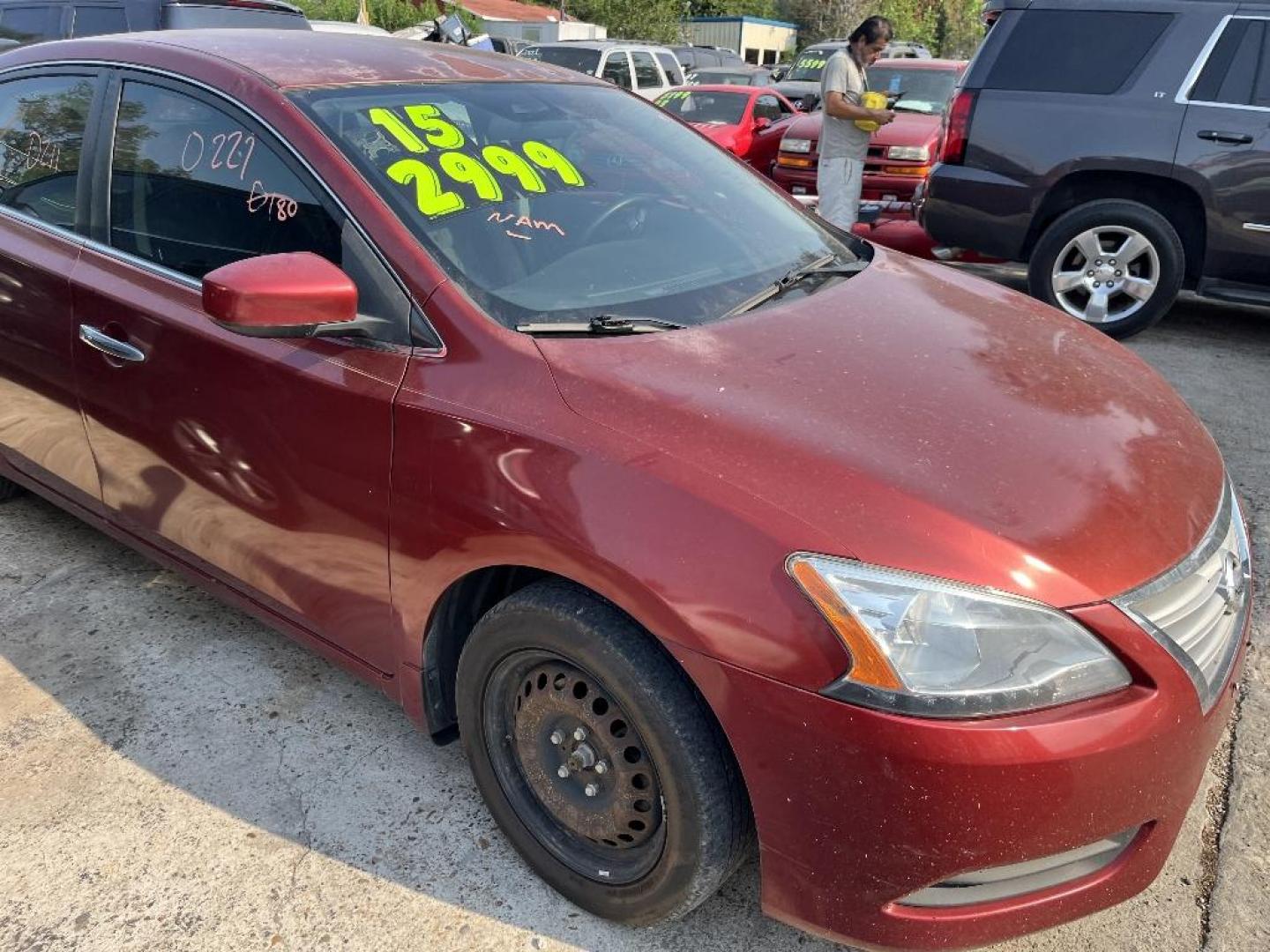 2015 RED NISSAN SENTRA S 6MT (3N1AB7AP0FY) with an 1.8L L4 SFI DOHC 16V engine, AUTOMATIC transmission, located at 2303 West Mt. Houston, Houston, Texas, 77038, (281) 507-3956, 29.771597, -95.339569 - Photo#2