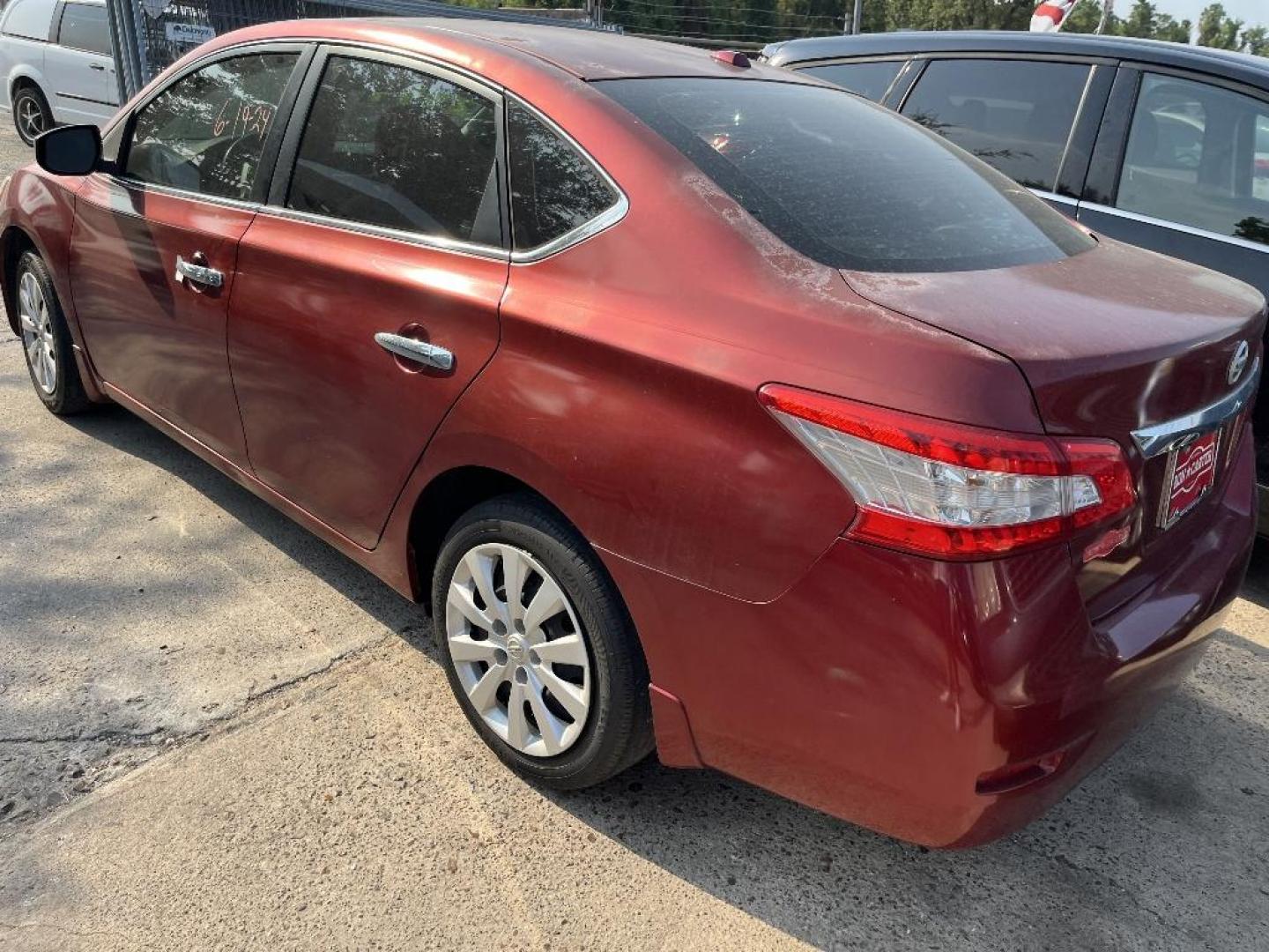 2015 RED NISSAN SENTRA S 6MT (3N1AB7AP0FY) with an 1.8L L4 SFI DOHC 16V engine, AUTOMATIC transmission, located at 2303 West Mt. Houston, Houston, Texas, 77038, (281) 507-3956, 29.771597, -95.339569 - Photo#6