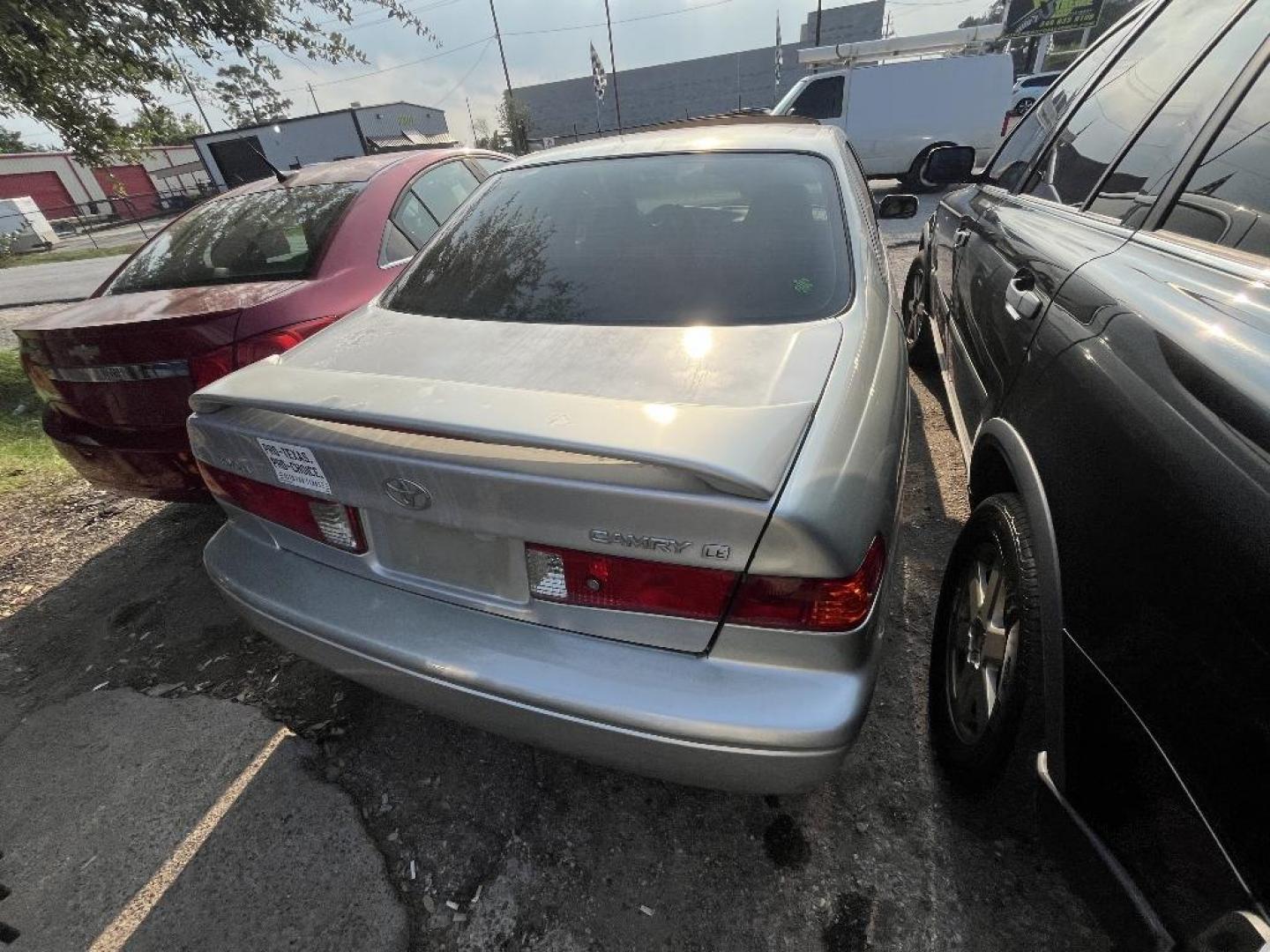 2000 BROWN TOYOTA CAMRY CE (JT2BG22K2Y0) with an 2.2L L4 DOHC 16V engine, AUTOMATIC transmission, located at 2303 West Mt. Houston, Houston, Texas, 77038, (281) 507-3956, 29.771597, -95.339569 - Photo#5