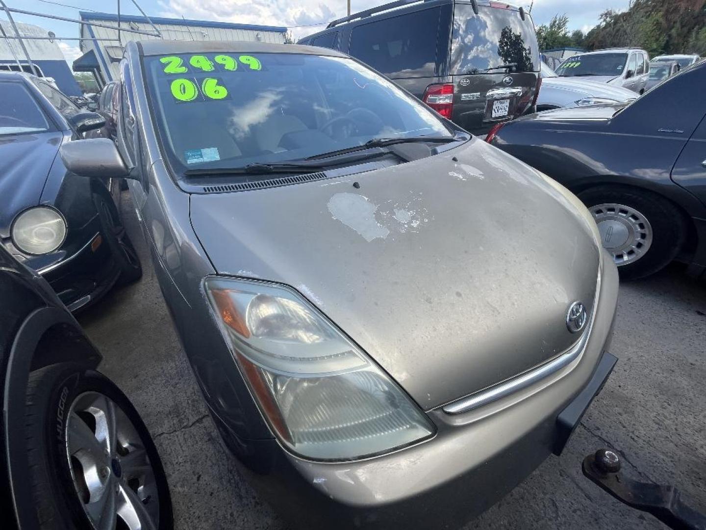 2006 GOLD TOYOTA PRIUS 4-Door Liftback (JTDKB20U663) with an 1.5L L4 DOHC 16V HYBRID engine, AUTOMATIC transmission, located at 2303 West Mt. Houston, Houston, Texas, 77038, (281) 507-3956, 29.771597, -95.339569 - Photo#0