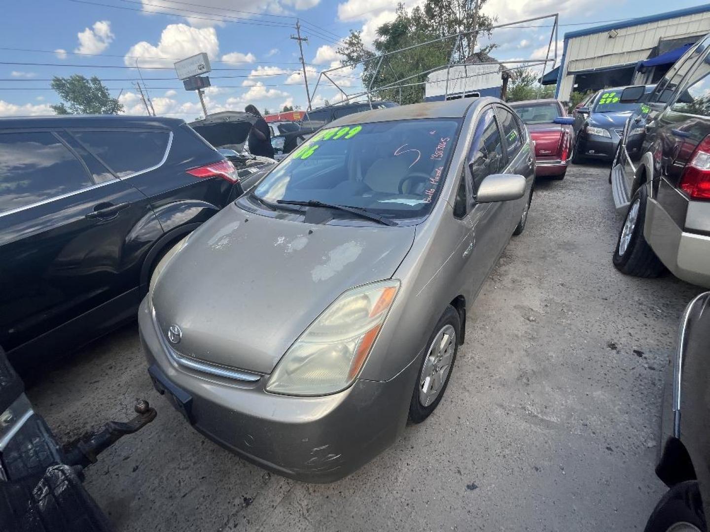 2006 GOLD TOYOTA PRIUS 4-Door Liftback (JTDKB20U663) with an 1.5L L4 DOHC 16V HYBRID engine, AUTOMATIC transmission, located at 2303 West Mt. Houston, Houston, Texas, 77038, (281) 507-3956, 29.771597, -95.339569 - Photo#1