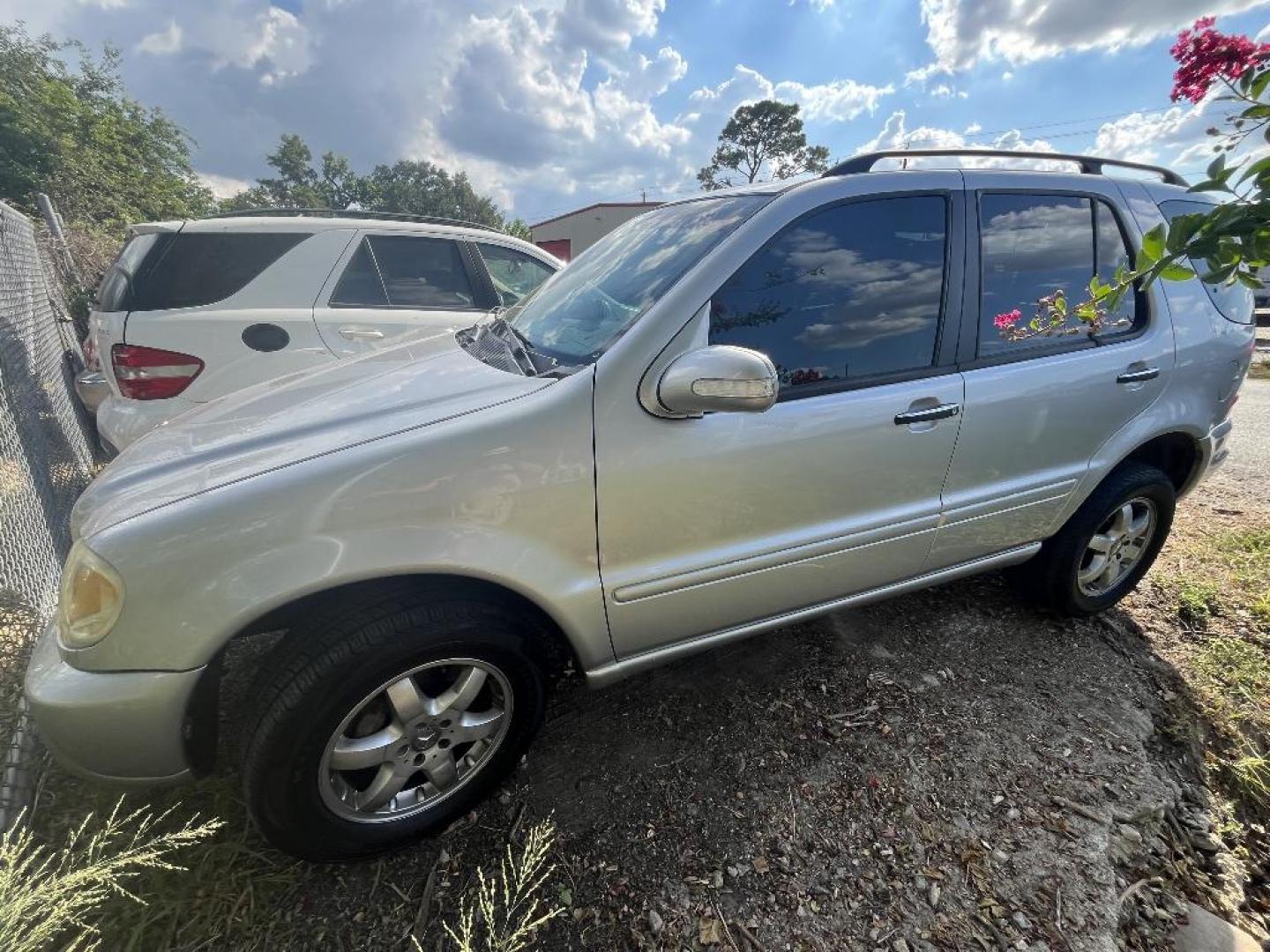 2002 BROWN MERCEDES-BENZ M-CLASS ML500 (4JGAB75EX2A) with an 5.0L V8 SOHC 24V engine, AUTOMATIC transmission, located at 2303 West Mt. Houston, Houston, Texas, 77038, (281) 507-3956, 29.771597, -95.339569 - Photo#0