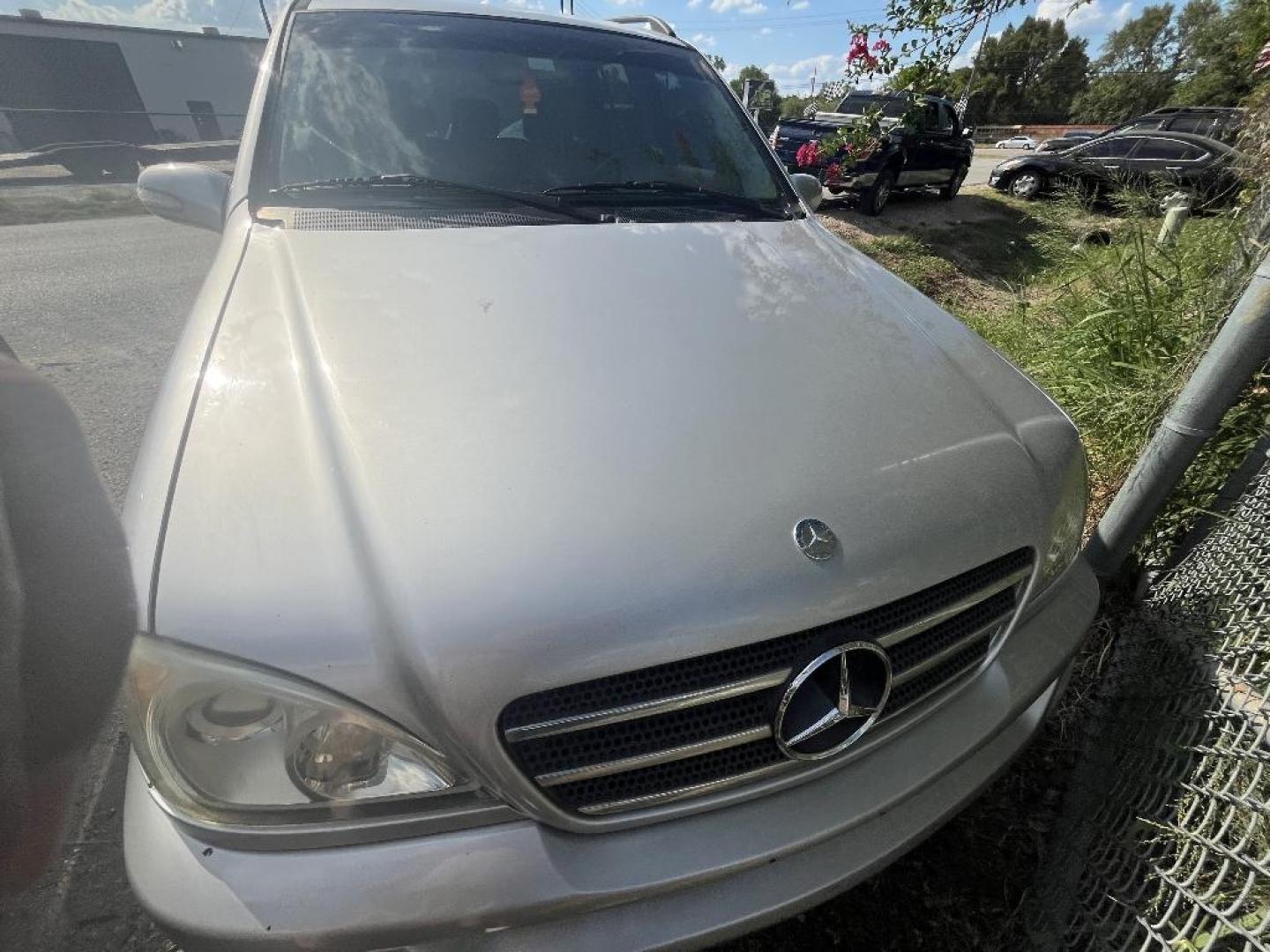 2002 BROWN MERCEDES-BENZ M-CLASS ML500 (4JGAB75EX2A) with an 5.0L V8 SOHC 24V engine, AUTOMATIC transmission, located at 2303 West Mt. Houston, Houston, Texas, 77038, (281) 507-3956, 29.771597, -95.339569 - Photo#2