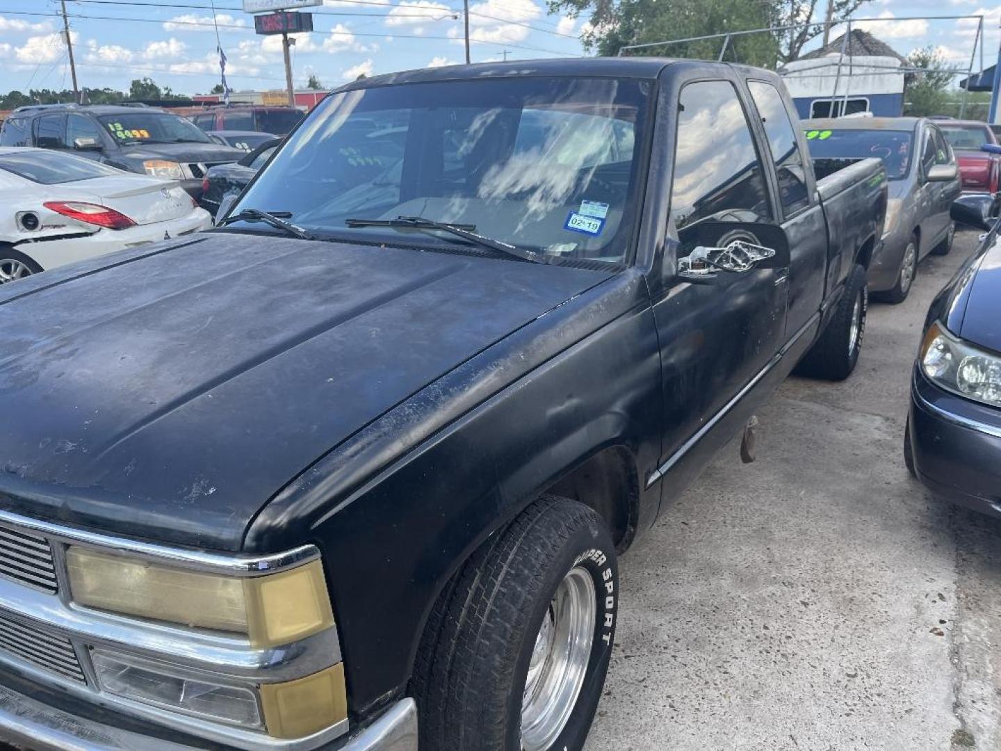 1995 BLACK CHEVROLET C/K 1500 Ext. Cab 6.5-ft. Bed 2WD (2GCEC19K4S1) with an 5.7L V8 OHV 16V engine, AUTOMATIC transmission, located at 2303 West Mt. Houston, Houston, Texas, 77038, (281) 507-3956, 29.771597, -95.339569 - Photo#0