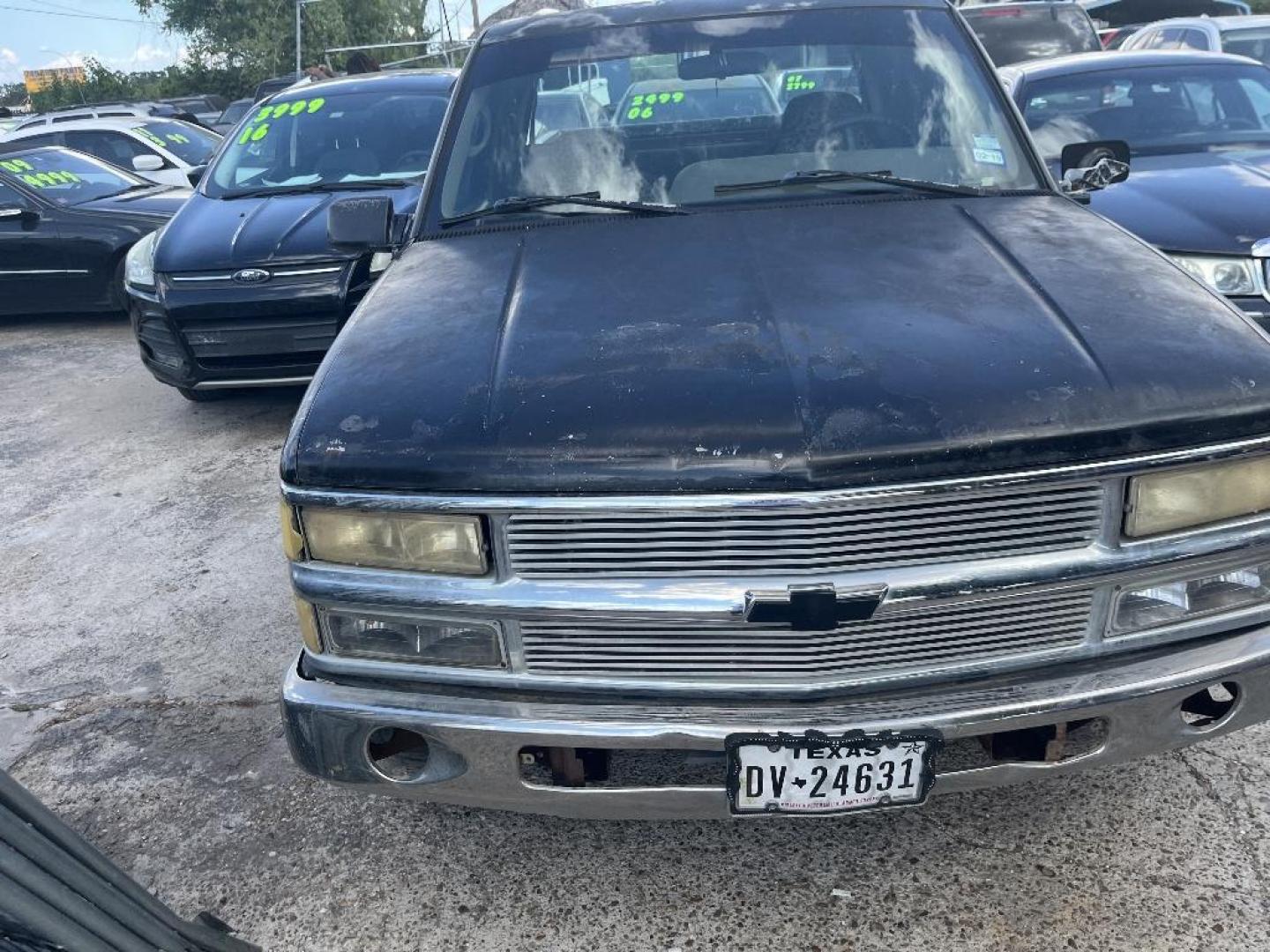 1995 BLACK CHEVROLET C/K 1500 Ext. Cab 6.5-ft. Bed 2WD (2GCEC19K4S1) with an 5.7L V8 OHV 16V engine, AUTOMATIC transmission, located at 2303 West Mt. Houston, Houston, Texas, 77038, (281) 507-3956, 29.771597, -95.339569 - Photo#3