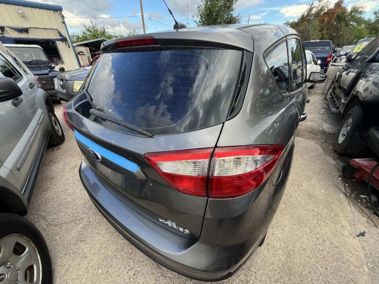 2014 GRAY FORD C-MAX HYBRID SE (1FADP5AU7EL) with an 2.0L L4 DOHC 16V HYBRID engine, AUTOMATIC transmission, located at 2303 West Mt. Houston, Houston, Texas, 77038, (281) 507-3956, 29.771597, -95.339569 - Photo#1