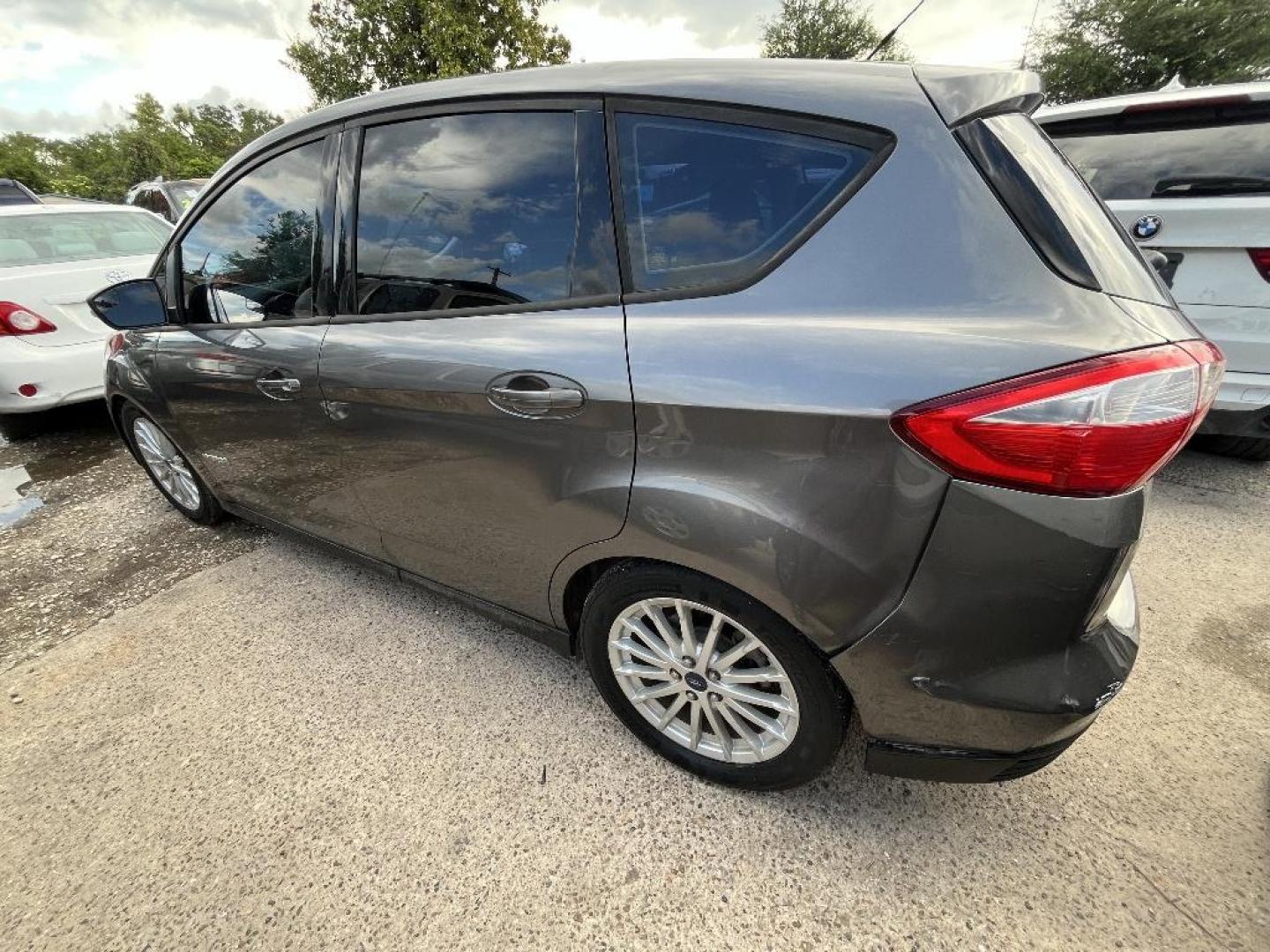 2014 GRAY FORD C-MAX HYBRID SE (1FADP5AU7EL) with an 2.0L L4 DOHC 16V HYBRID engine, AUTOMATIC transmission, located at 2303 West Mt. Houston, Houston, Texas, 77038, (281) 507-3956, 29.771597, -95.339569 - Photo#2