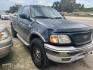 2002 BLUE FORD F-150 XL SuperCab Short Bed 4WD (1FTRX18L42K) with an 5.4L V8 SOHC 16V engine, AUTOMATIC transmission, located at 2303 West Mt. Houston, Houston, Texas, 77038, (281) 507-3956, 29.771597, -95.339569 - Photo#0