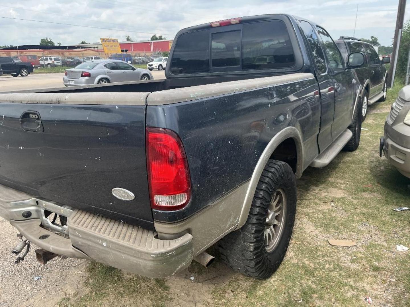 2002 BLUE FORD F-150 XL SuperCab Short Bed 4WD (1FTRX18L42K) with an 5.4L V8 SOHC 16V engine, AUTOMATIC transmission, located at 2303 West Mt. Houston, Houston, Texas, 77038, (281) 507-3956, 29.771597, -95.339569 - Photo#3