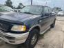 2002 BLUE FORD F-150 XL SuperCab Short Bed 4WD (1FTRX18L42K) with an 5.4L V8 SOHC 16V engine, AUTOMATIC transmission, located at 2303 West Mt. Houston, Houston, Texas, 77038, (281) 507-3956, 29.771597, -95.339569 - Photo#4