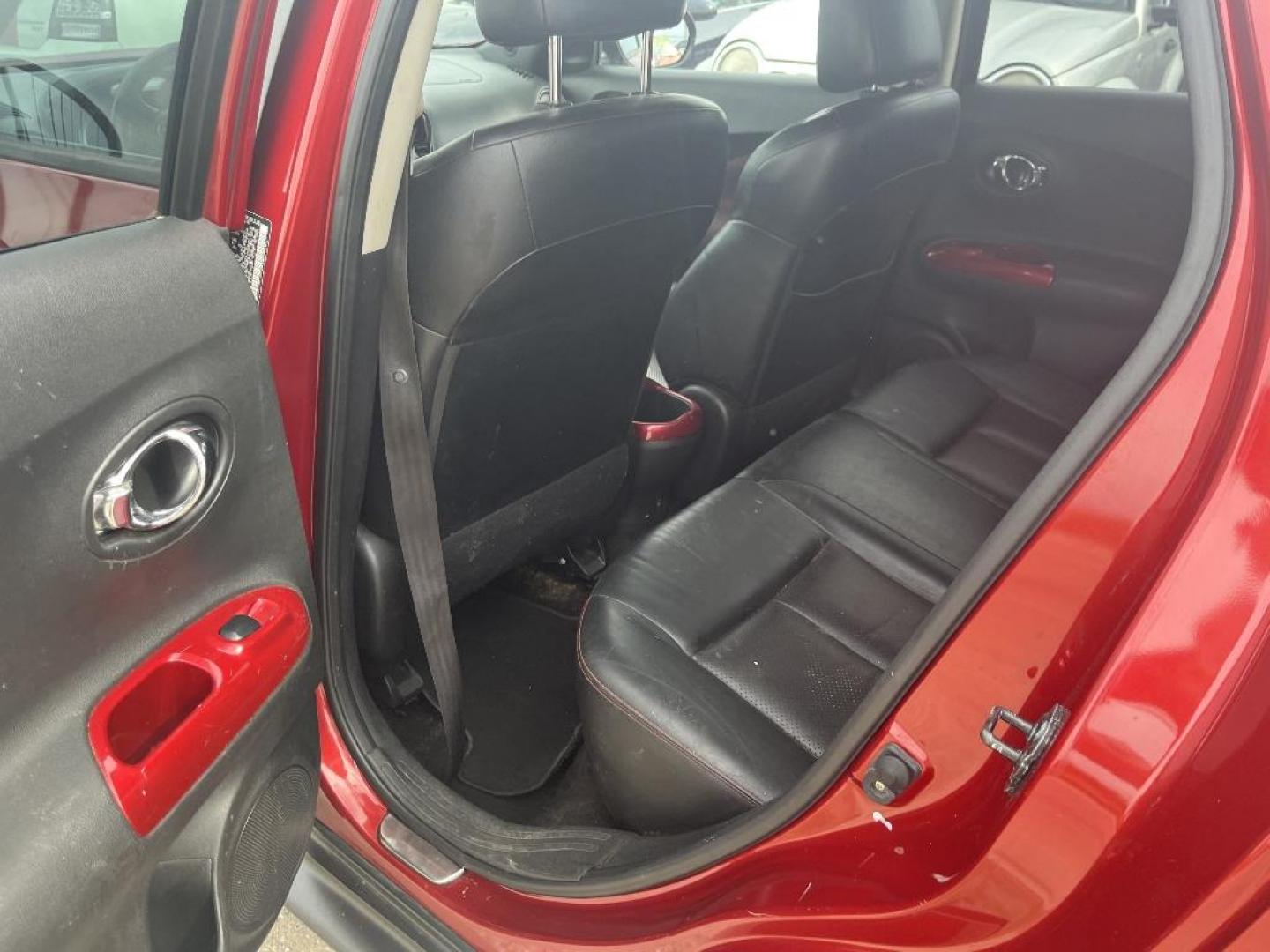 2013 RED NISSAN JUKE S FWD (JN8AF5MR3DT) with an 1.6L L4 DOHC 16V TURBO engine, AUTOMATIC transmission, located at 2303 West Mt. Houston, Houston, Texas, 77038, (281) 507-3956, 29.771597, -95.339569 - Photo#2