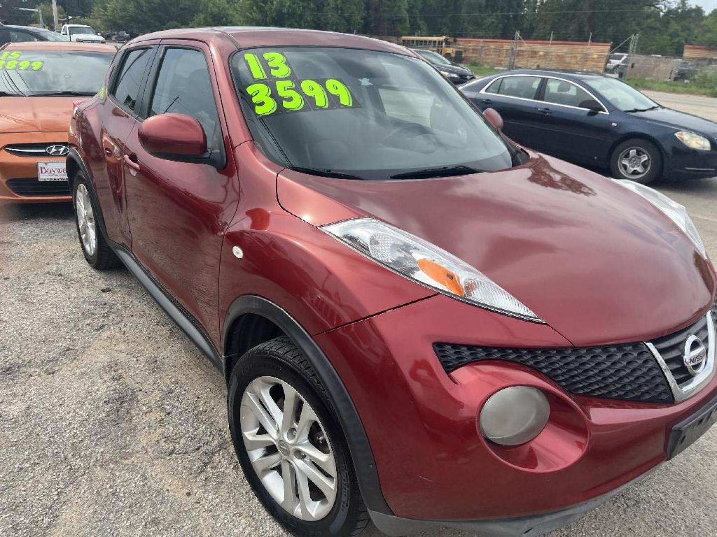 2013 RED NISSAN JUKE S FWD (JN8AF5MR3DT) with an 1.6L L4 DOHC 16V TURBO engine, AUTOMATIC transmission, located at 2303 West Mt. Houston, Houston, Texas, 77038, (281) 507-3956, 29.771597, -95.339569 - Photo#3