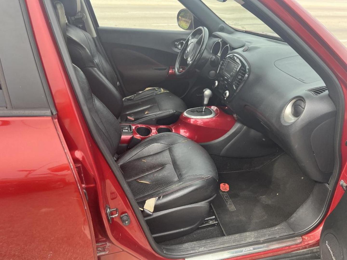 2013 RED NISSAN JUKE S FWD (JN8AF5MR3DT) with an 1.6L L4 DOHC 16V TURBO engine, AUTOMATIC transmission, located at 2303 West Mt. Houston, Houston, Texas, 77038, (281) 507-3956, 29.771597, -95.339569 - Photo#4