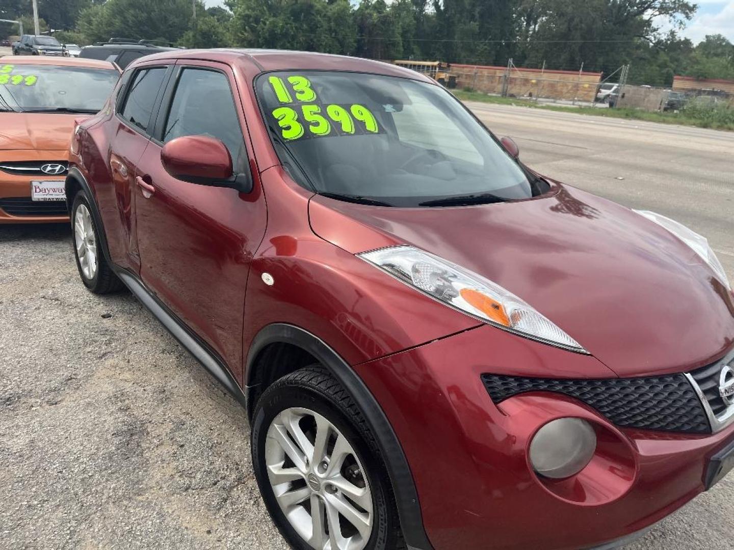 2013 RED NISSAN JUKE S FWD (JN8AF5MR3DT) with an 1.6L L4 DOHC 16V TURBO engine, AUTOMATIC transmission, located at 2303 West Mt. Houston, Houston, Texas, 77038, (281) 507-3956, 29.771597, -95.339569 - Photo#5