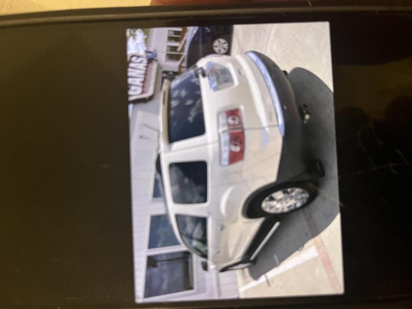 2010 WHITE GMC ACADIA SLT-2 FWD (1GKLRNED7AJ) with an 3.6L V6 DOHC 24V engine, AUTOMATIC transmission, located at 2303 West Mt. Houston, Houston, Texas, 77038, (281) 507-3956, 29.771597, -95.339569 - Photo#1