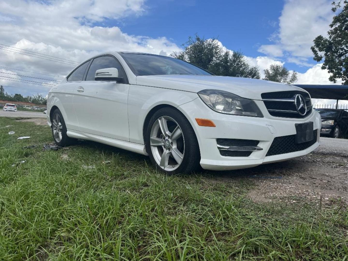 2015 WHITE MERCEDES-BENZ C-CLASS C250 Coupe (WDDGJ4HB7FG) with an 1.8L L4 DOHC 16V engine, AUTOMATIC transmission, located at 2303 West Mt. Houston, Houston, Texas, 77038, (281) 507-3956, 29.771597, -95.339569 - Photo#1