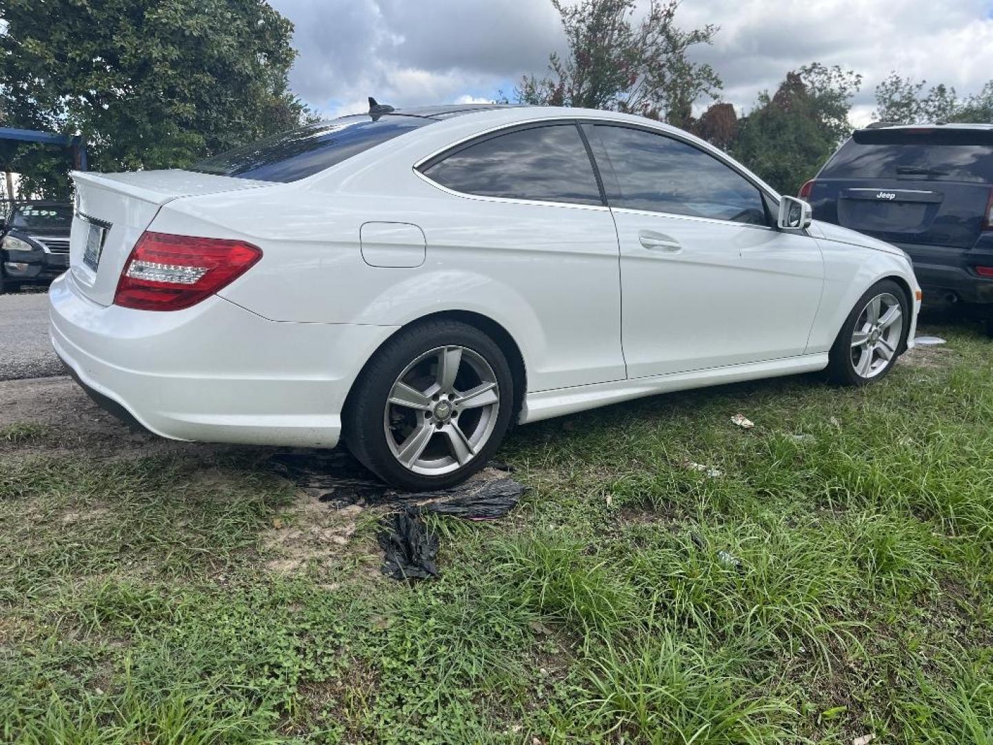 2015 WHITE MERCEDES-BENZ C-CLASS C250 Coupe (WDDGJ4HB7FG) with an 1.8L L4 DOHC 16V engine, AUTOMATIC transmission, located at 2303 West Mt. Houston, Houston, Texas, 77038, (281) 507-3956, 29.771597, -95.339569 - Photo#2