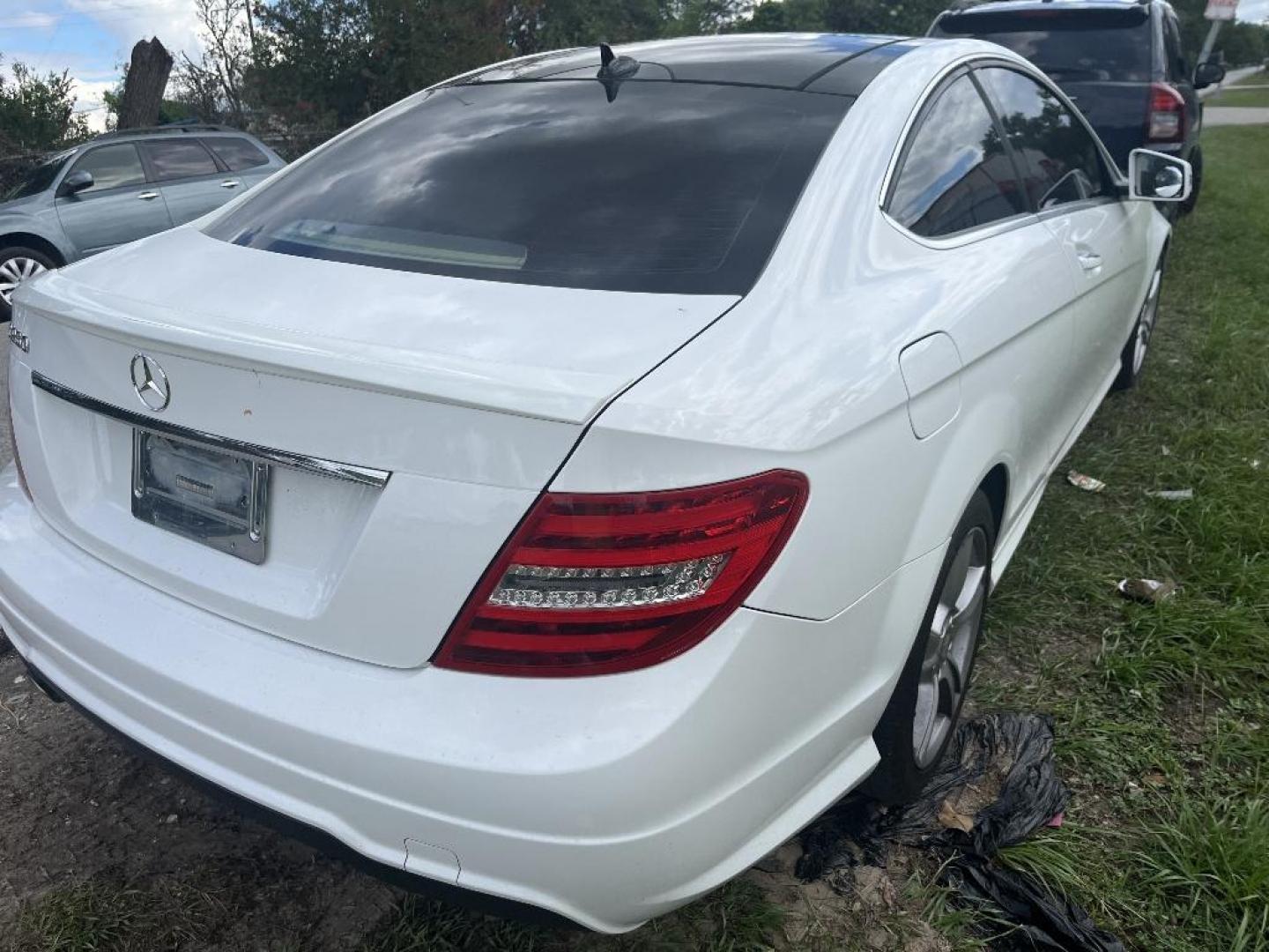 2015 WHITE MERCEDES-BENZ C-CLASS C250 Coupe (WDDGJ4HB7FG) with an 1.8L L4 DOHC 16V engine, AUTOMATIC transmission, located at 2303 West Mt. Houston, Houston, Texas, 77038, (281) 507-3956, 29.771597, -95.339569 - Photo#3