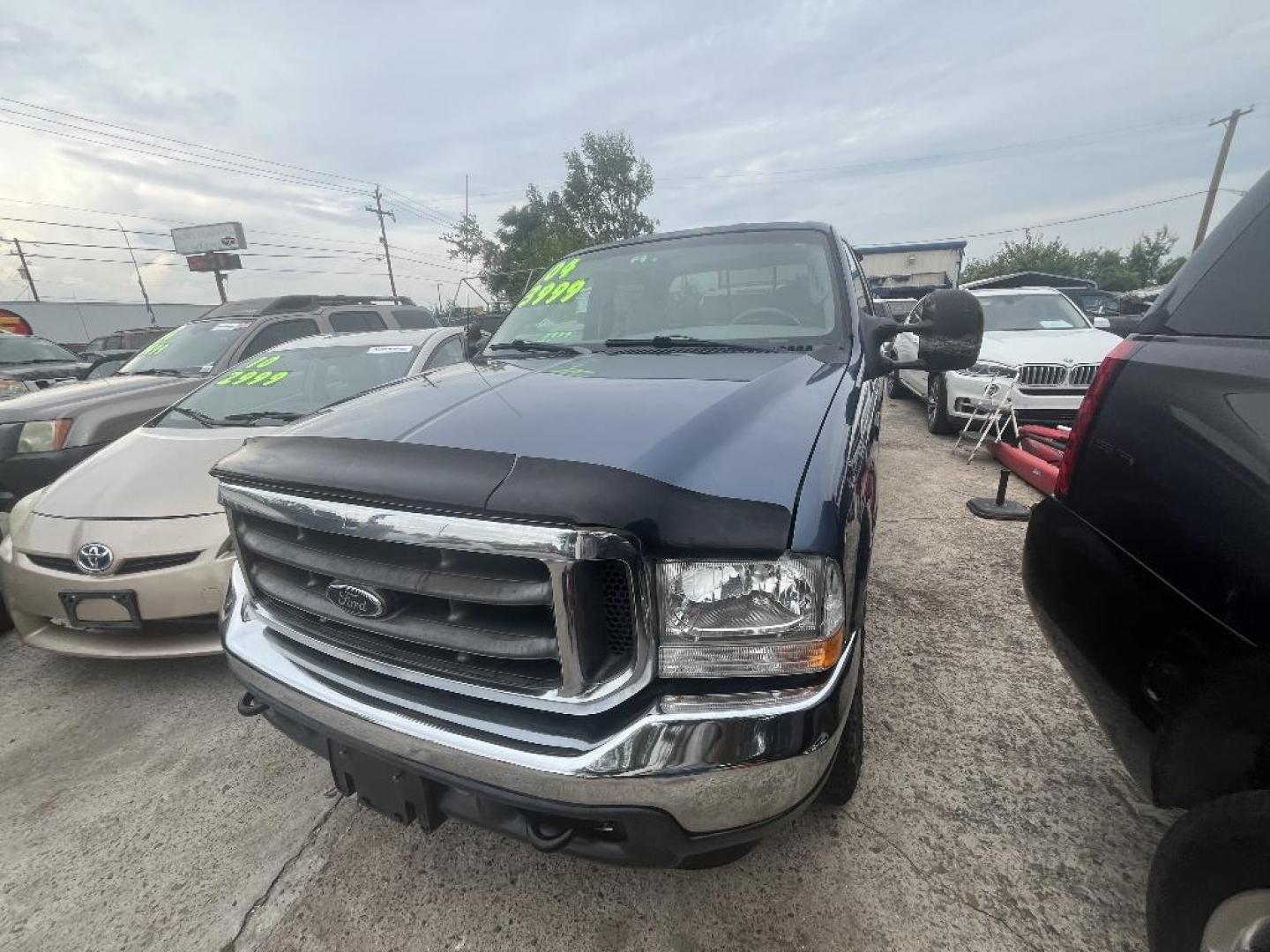 2004 BLUE FORD F-250 SD XL Crew Cab 2WD (1FTNW20P54E) with an 6.0L V8 OHV 32V TURBO DIESEL engine, AUTOMATIC transmission, located at 2303 West Mt. Houston, Houston, Texas, 77038, (281) 507-3956, 29.771597, -95.339569 - Photo#0